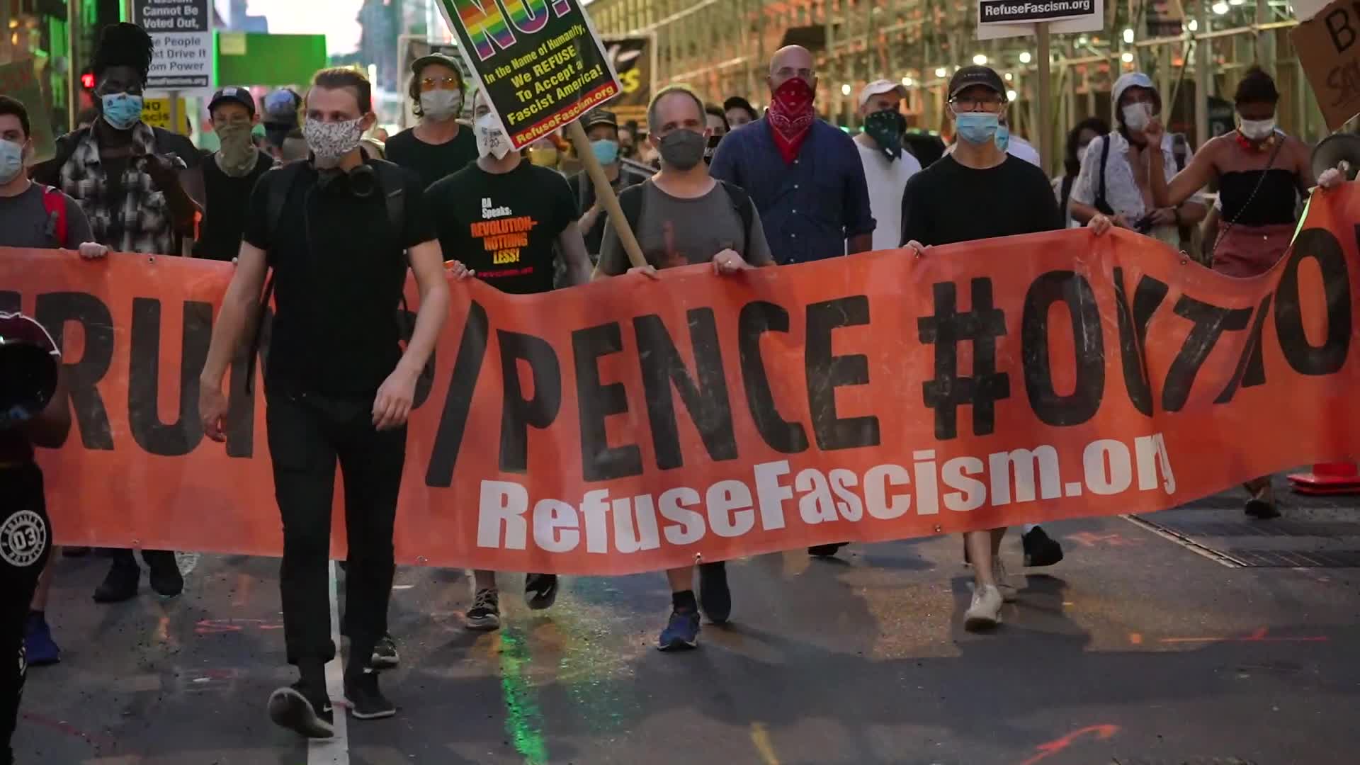 Protestors demand the resignation of President Trump and Vice President Pence as NYC enters Phase 4 of re-opening