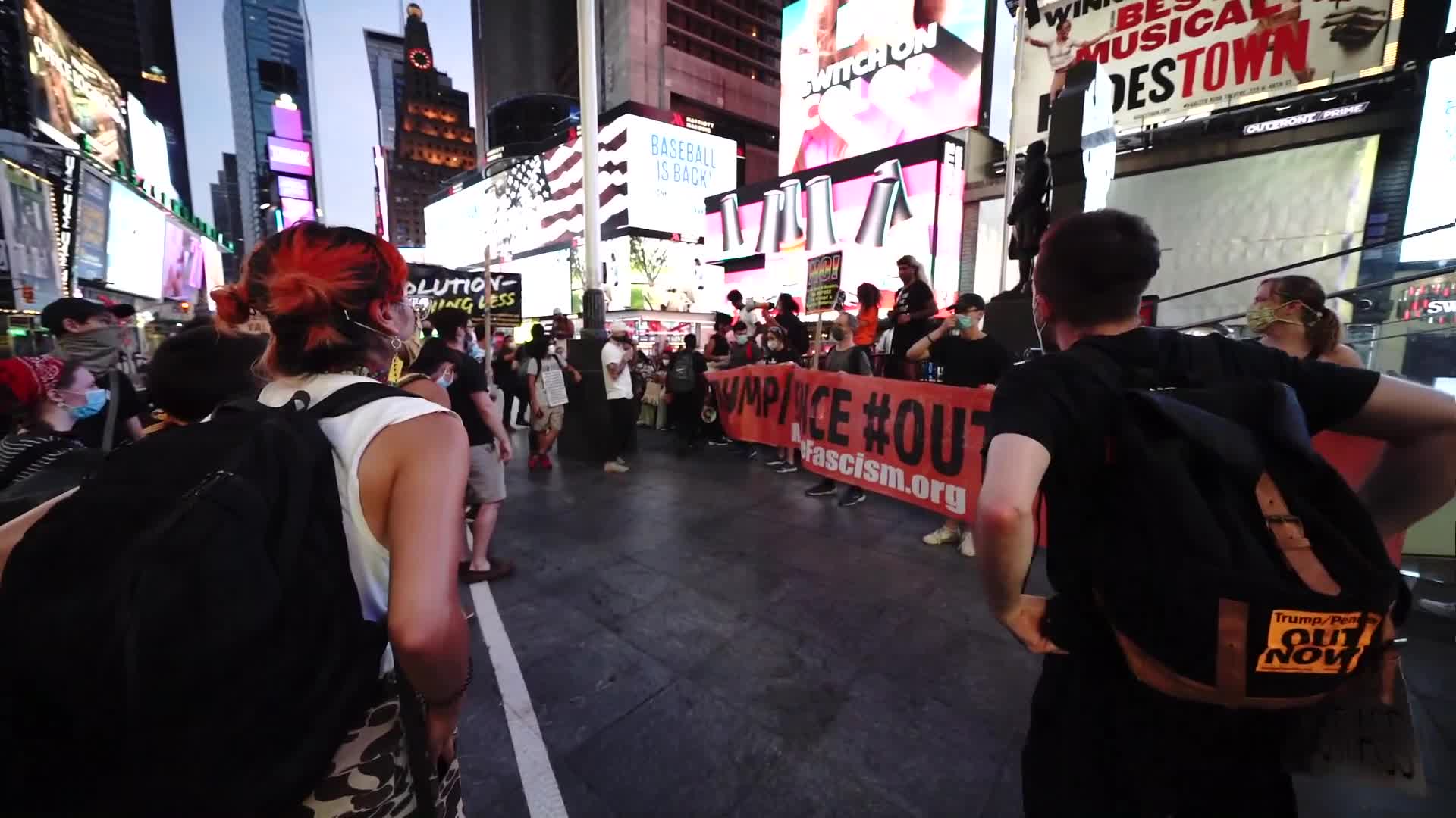 Protestors demand the resignation of President Trump and Vice President Pence as NYC enters Phase 4 of re-opening