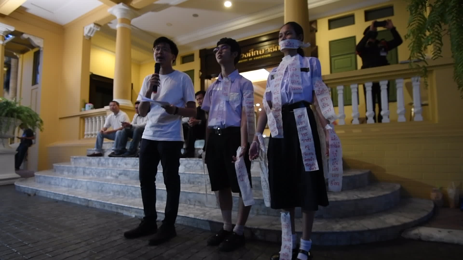 Thai students and teachers light candles against violence in schools