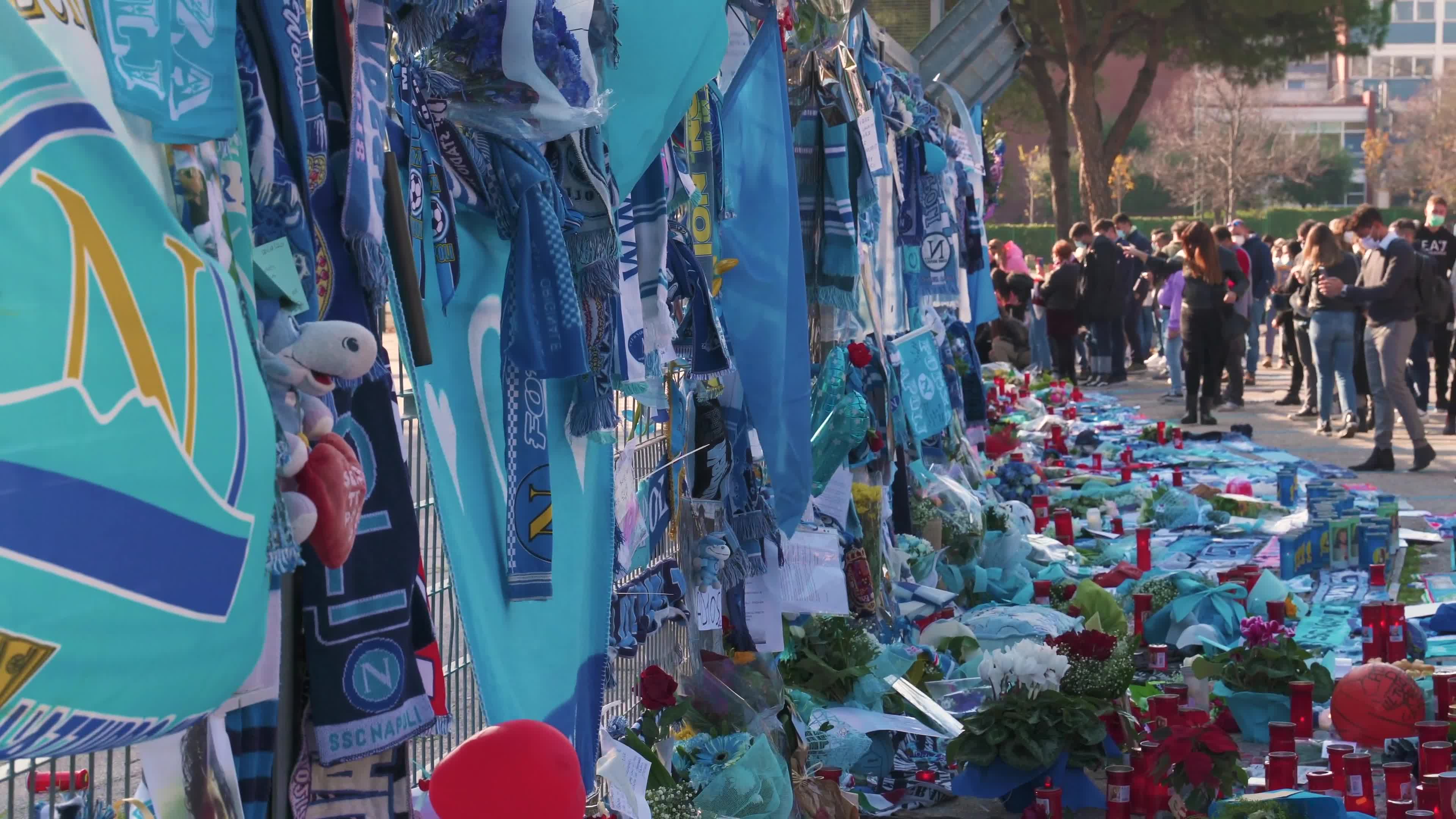 Maradona's fans bring homage to the soccer superstar in Naples