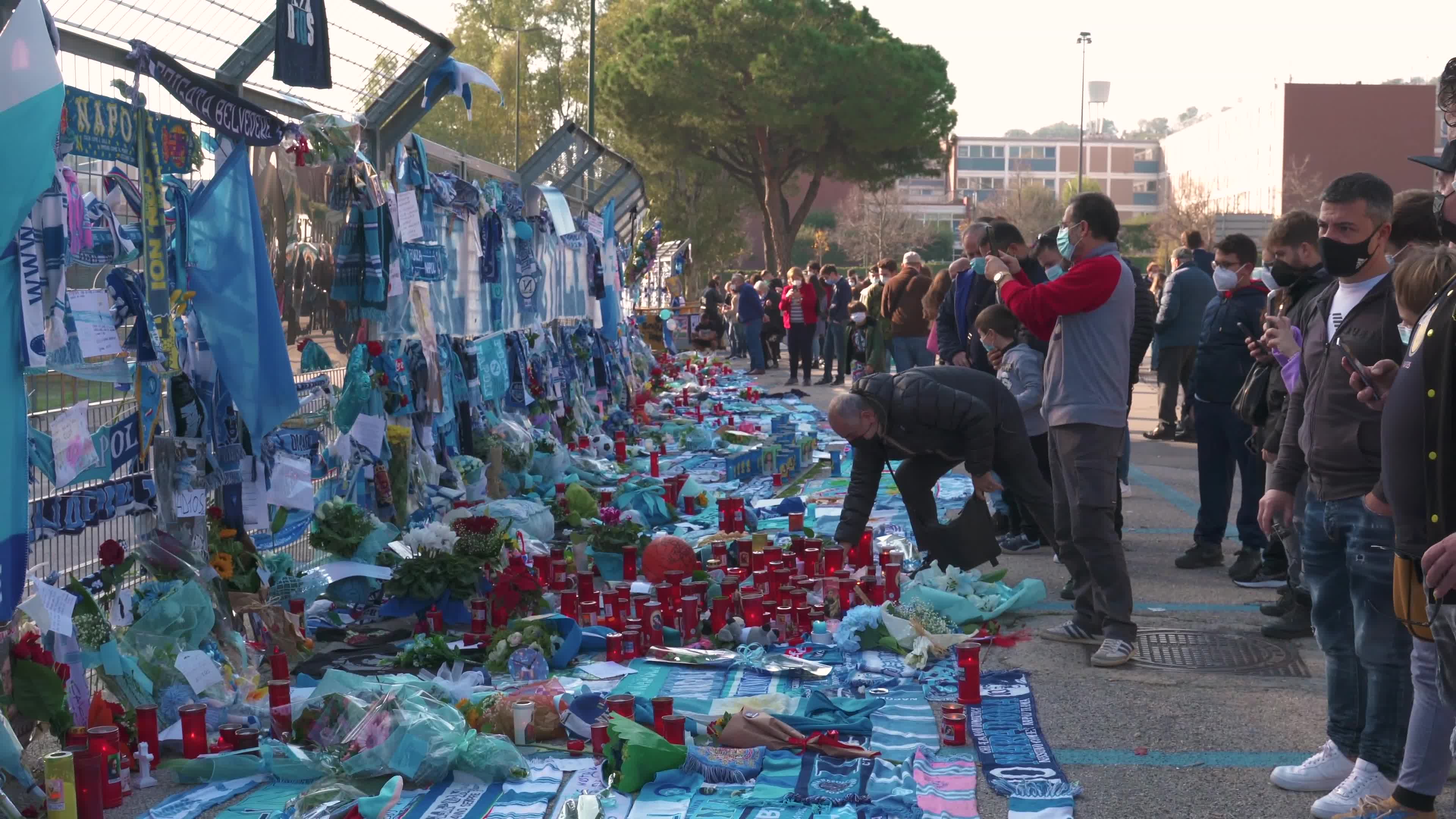 Maradona's fans bring homage to the soccer superstar in Naples