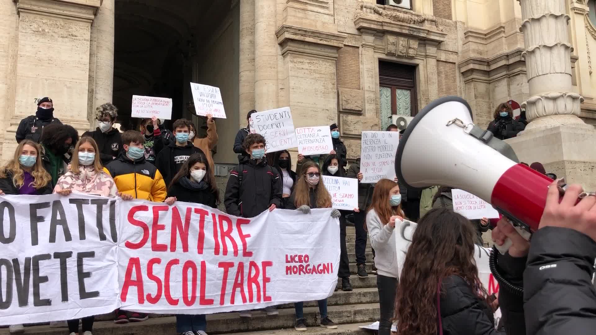 Students protest ouside the Ministry of Education in Rome