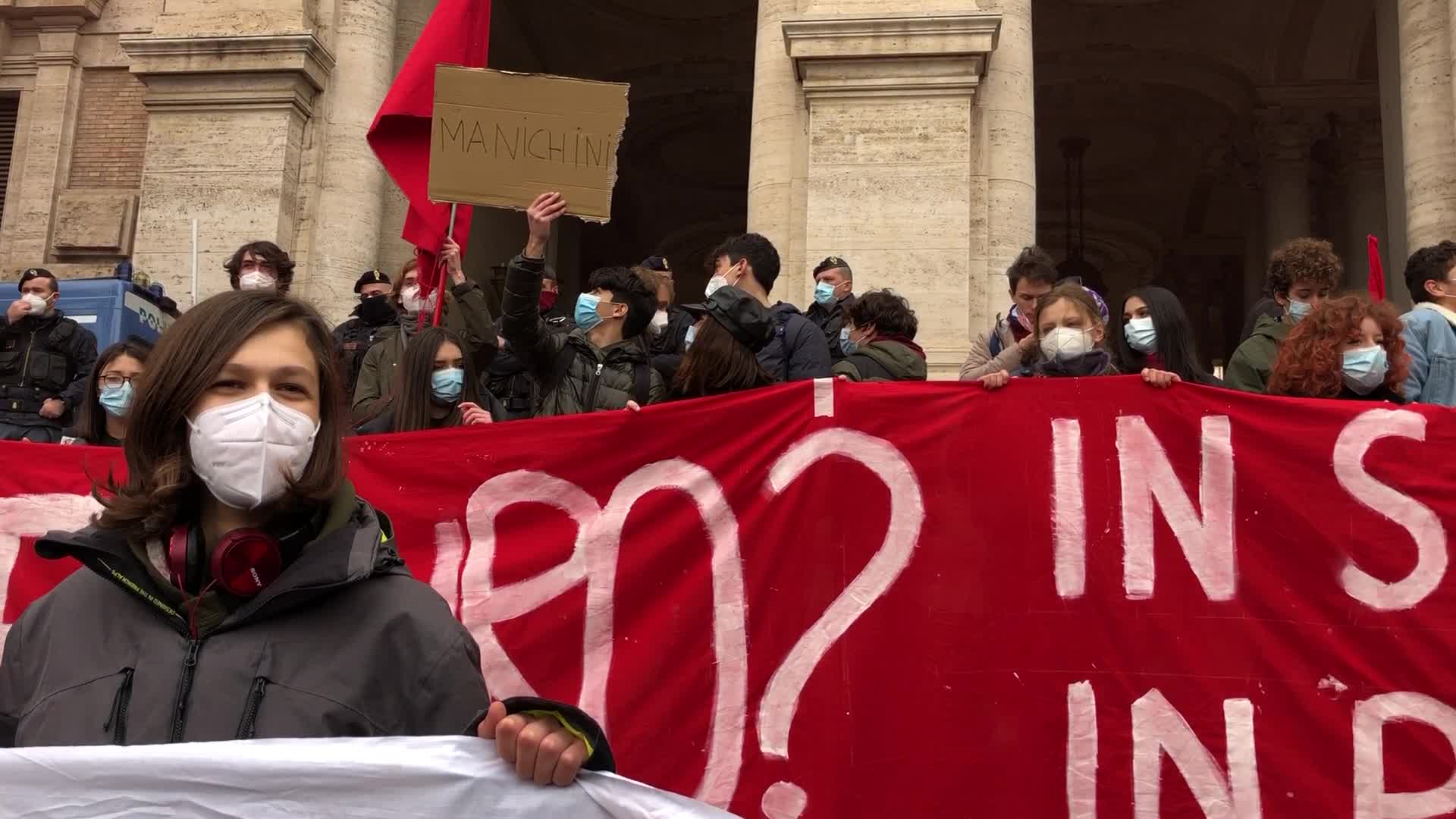 Students protest ouside the Ministry of Education in Rome