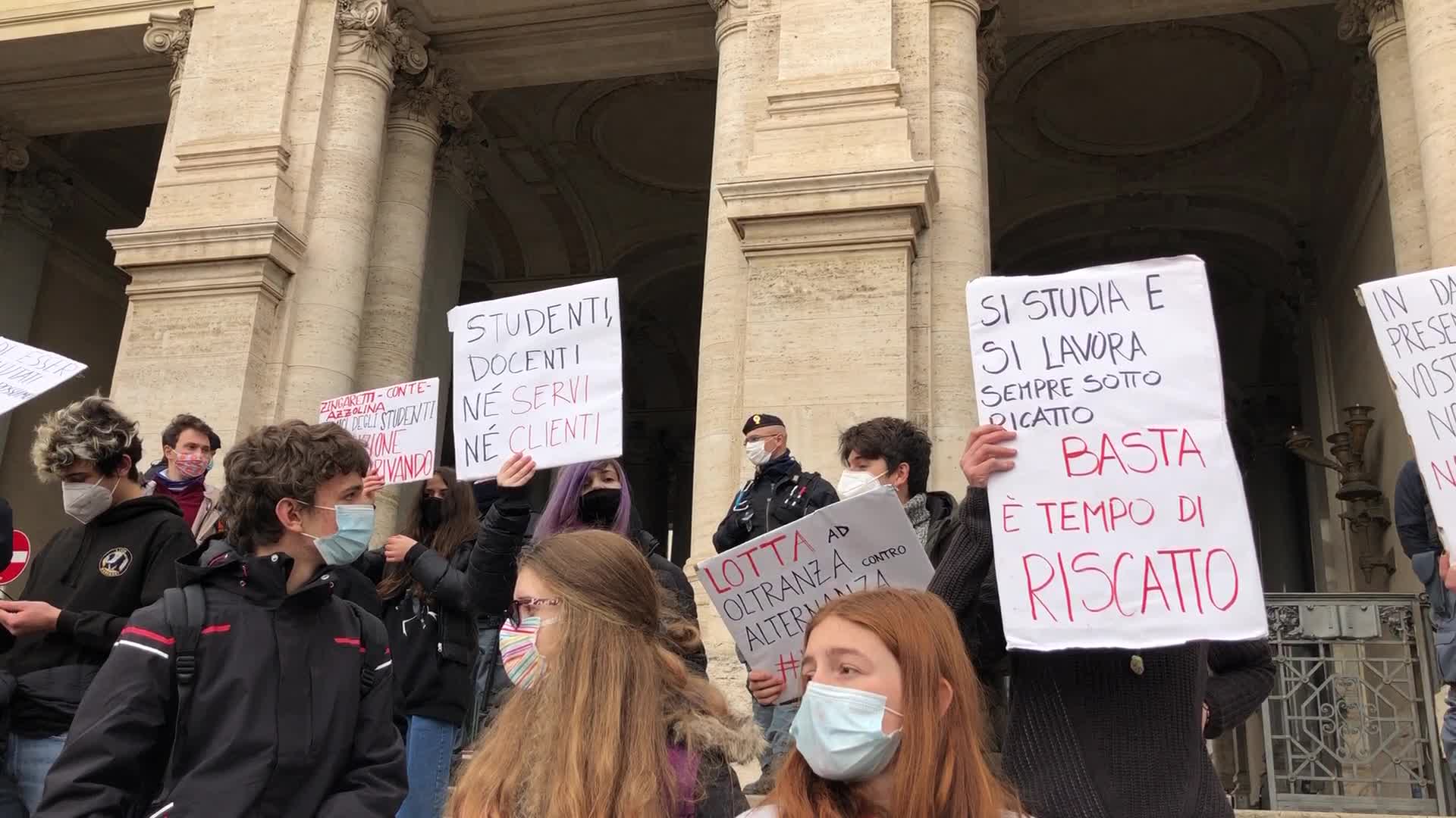 Students protest ouside the Ministry of Education in Rome