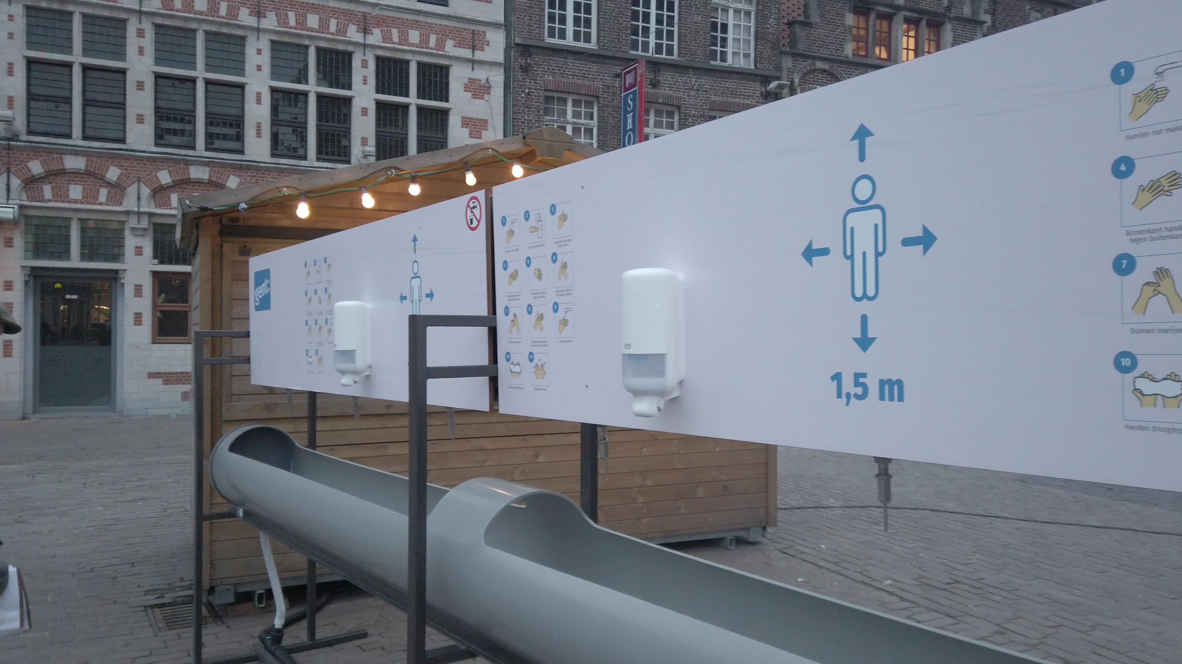 Installation of a public hand sanitizer in Korenmarkt