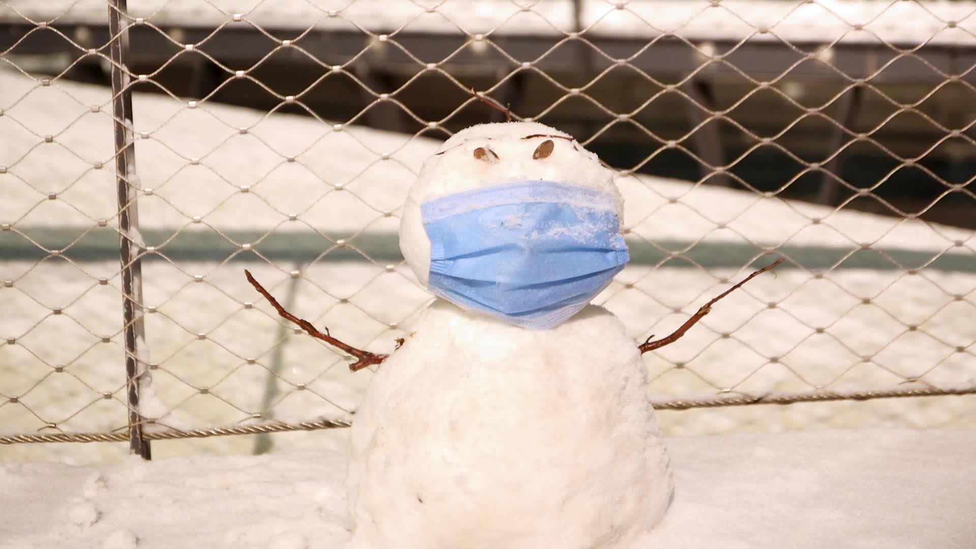 Snowman with a facemask in the Netherlands