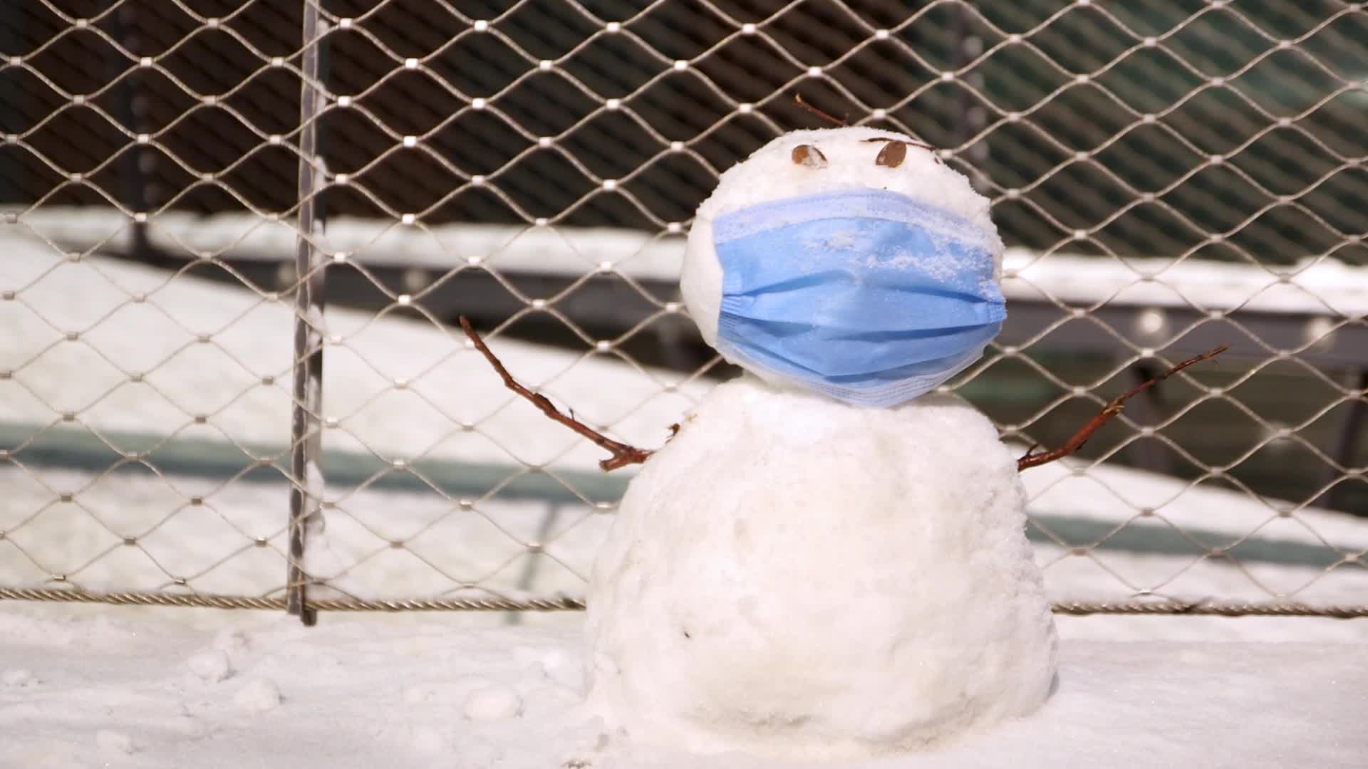 Snowman with a facemask in the Netherlands