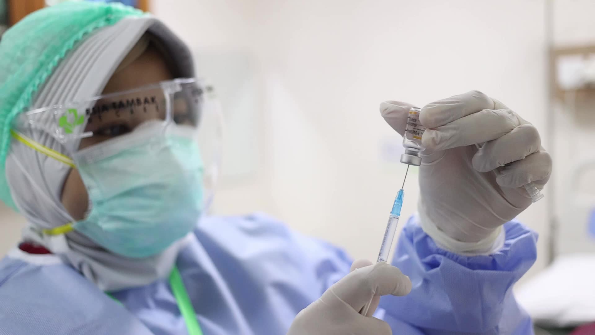 Indonesia's First Phase COVID-19 Vaccination