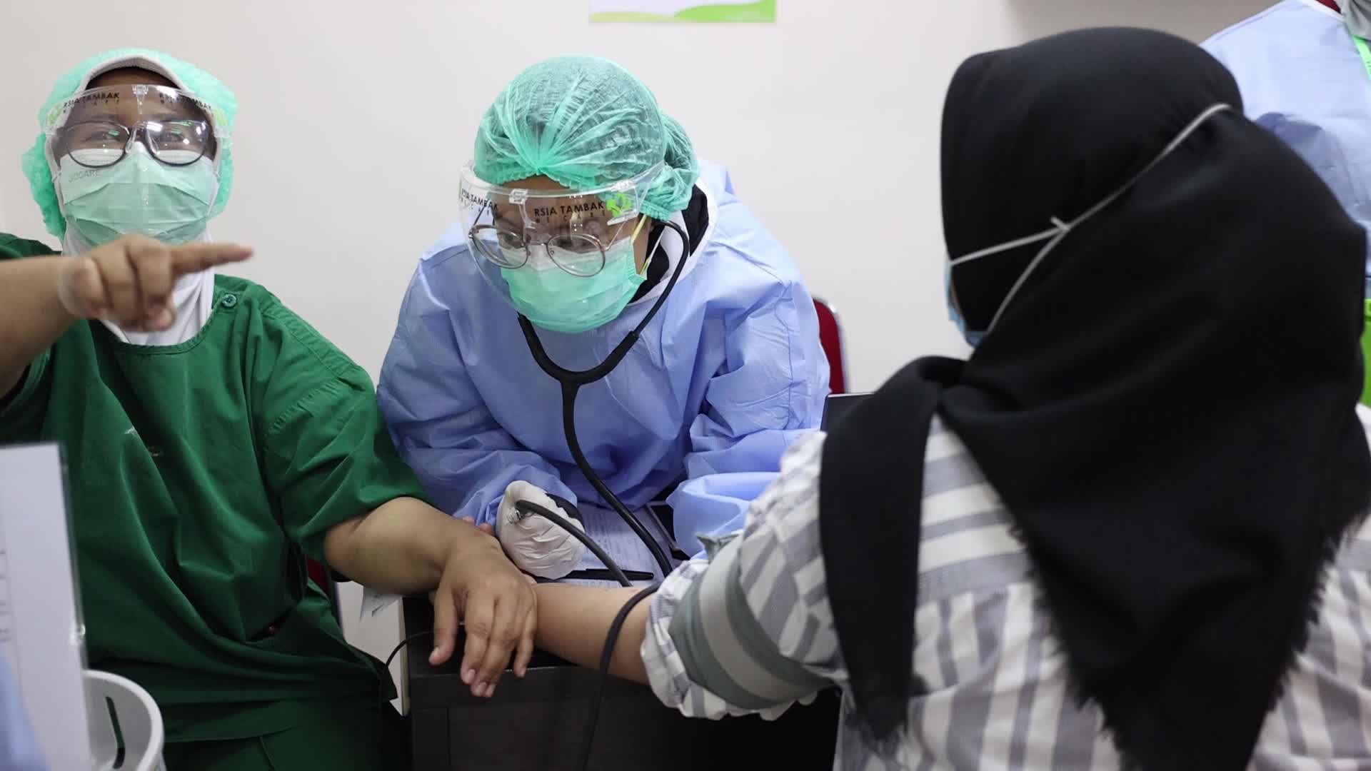 Indonesia's First Phase COVID-19 Vaccination