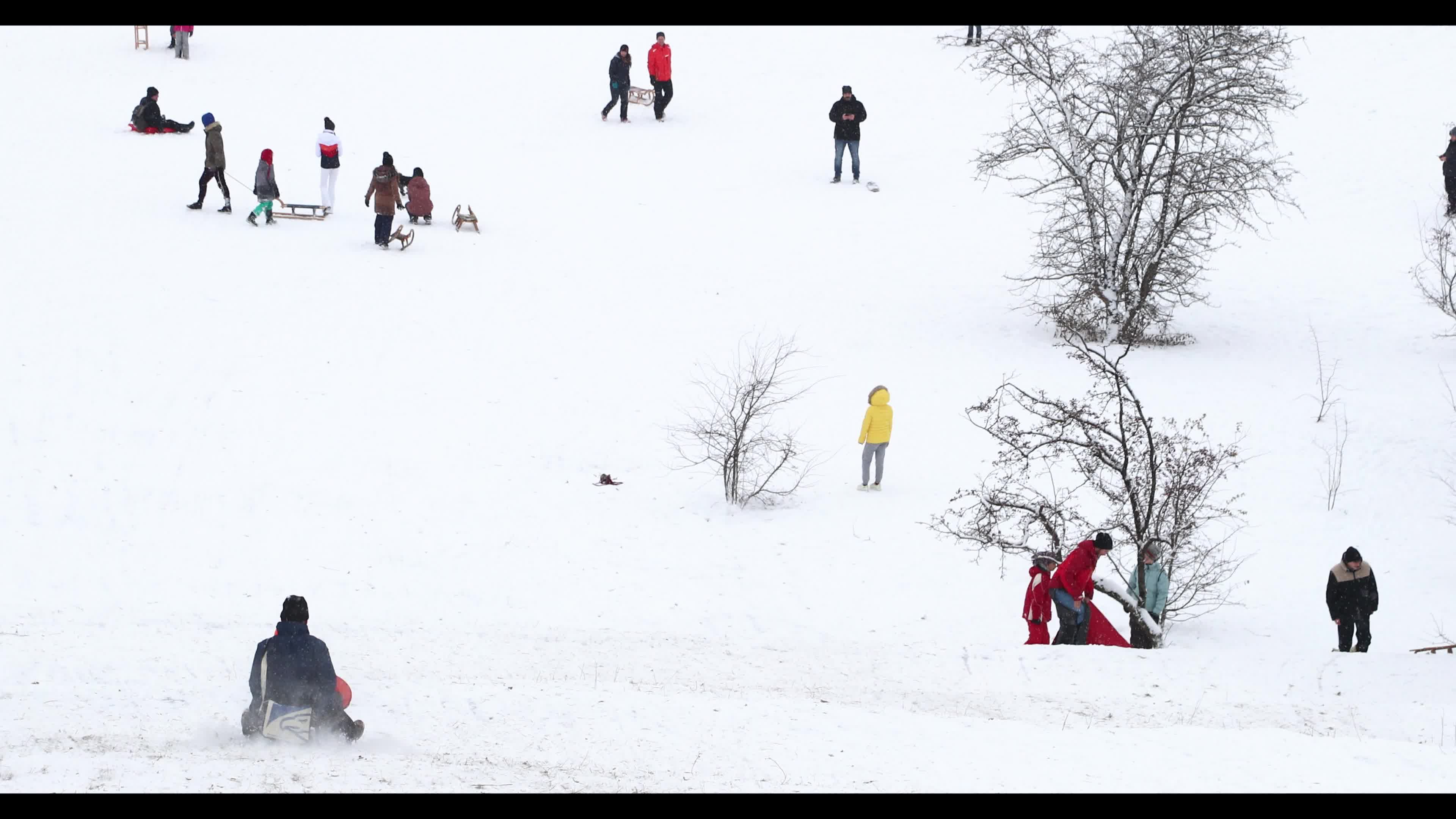 People gather in the Olympic Park in Munich amid the pandemic 