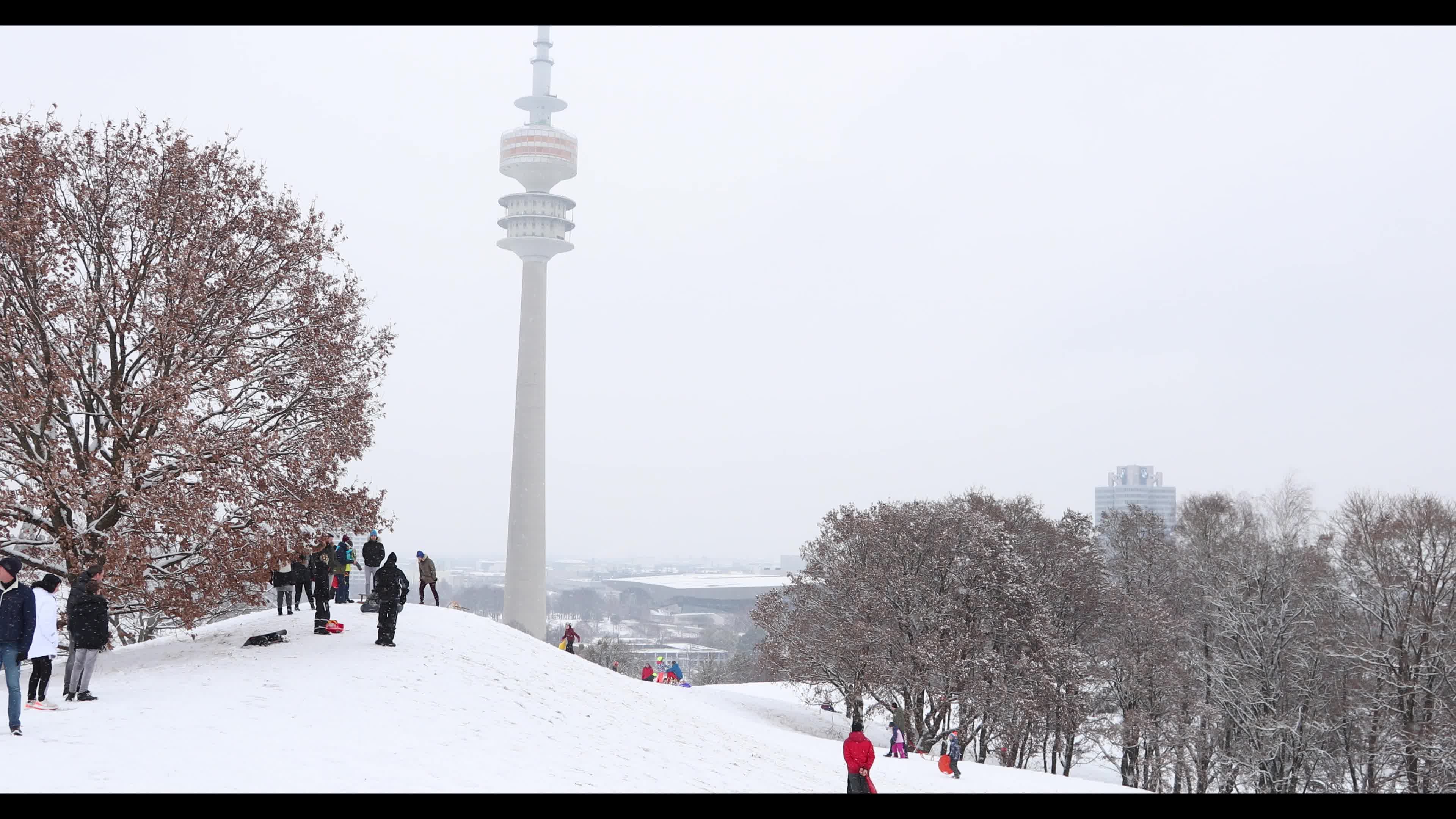 People gather in the Olympic Park in Munich amid the pandemic 