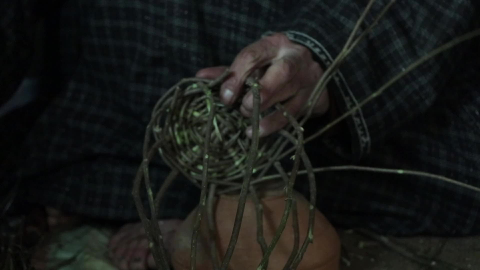 Kashmiri artisan makes Kangri, a traditional fire-pot