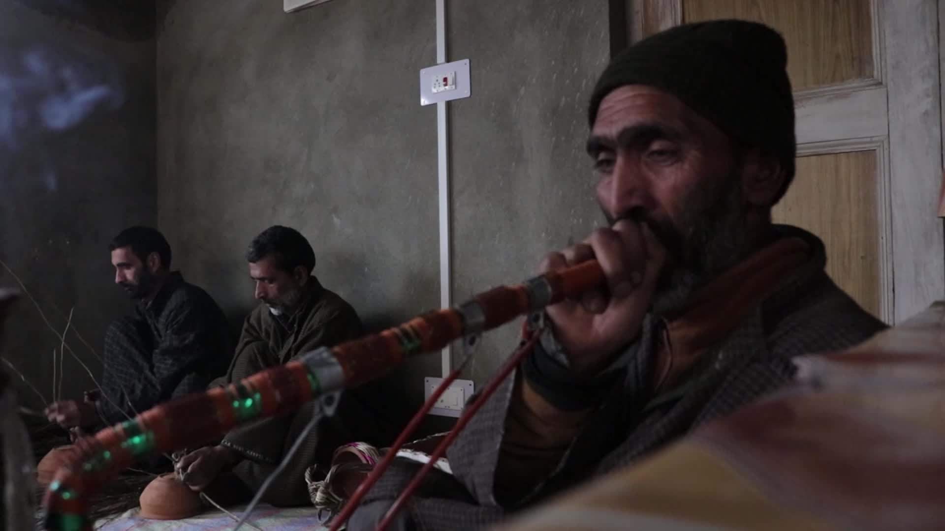 Kashmiri artisan makes Kangri, a traditional fire-pot