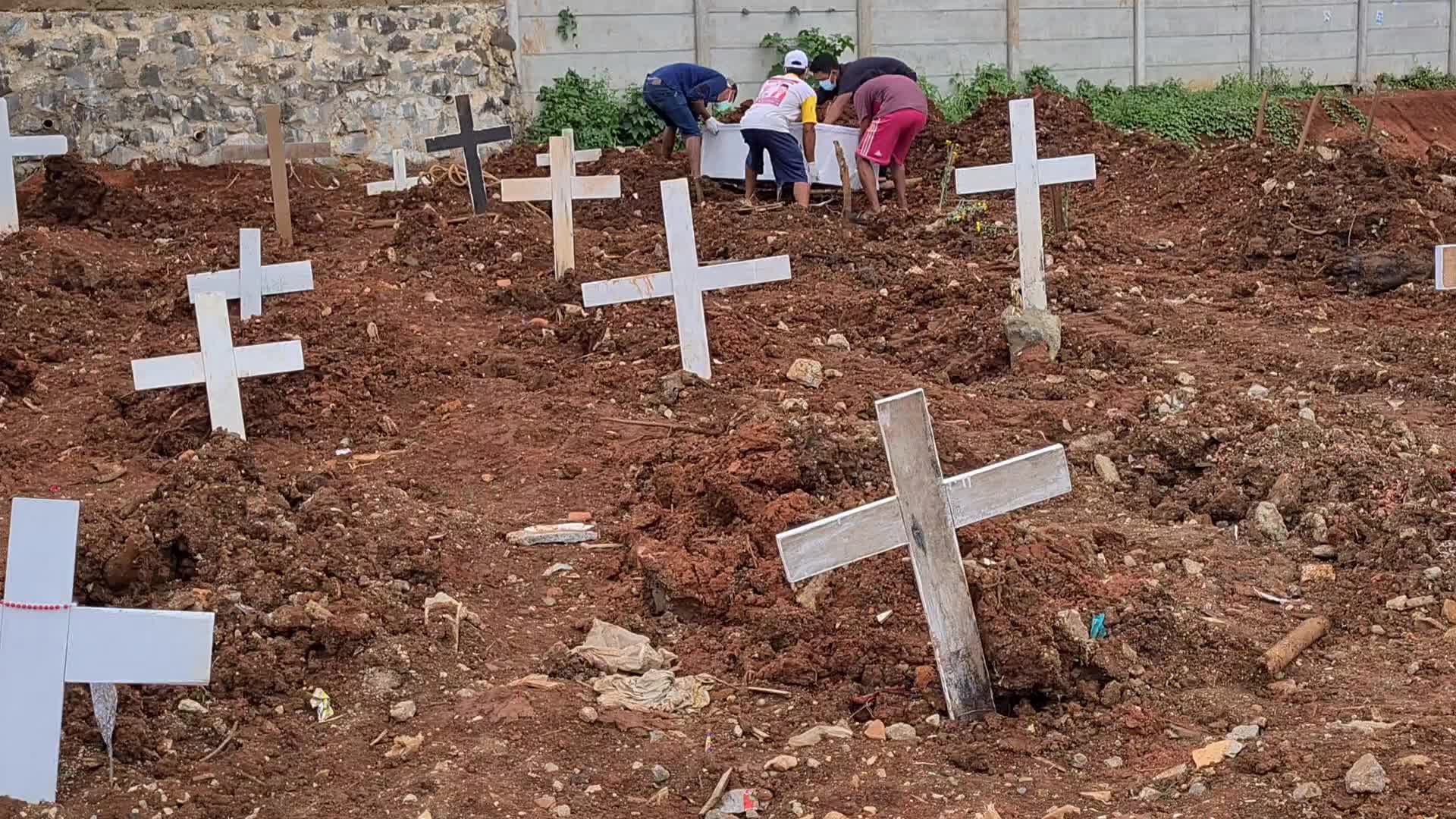 Burial of Covid-19 victims in Indonesia