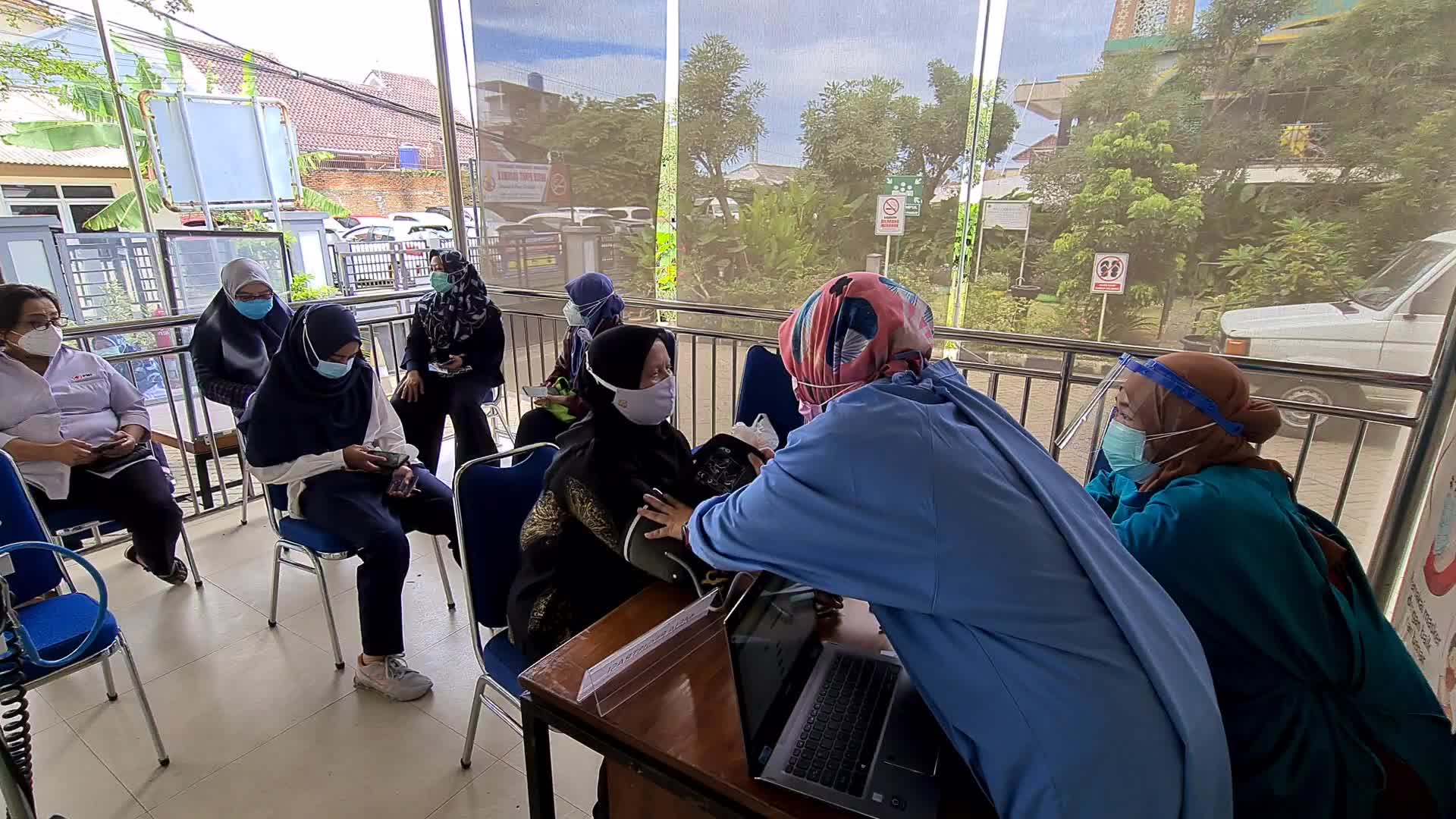 Indonesia starts vaccinating elderly health workers
