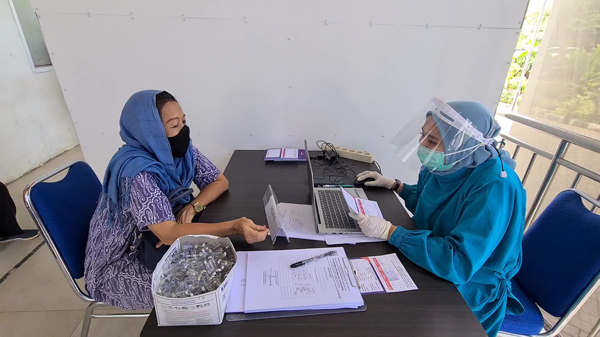 Indonesia starts vaccinating elderly health workers