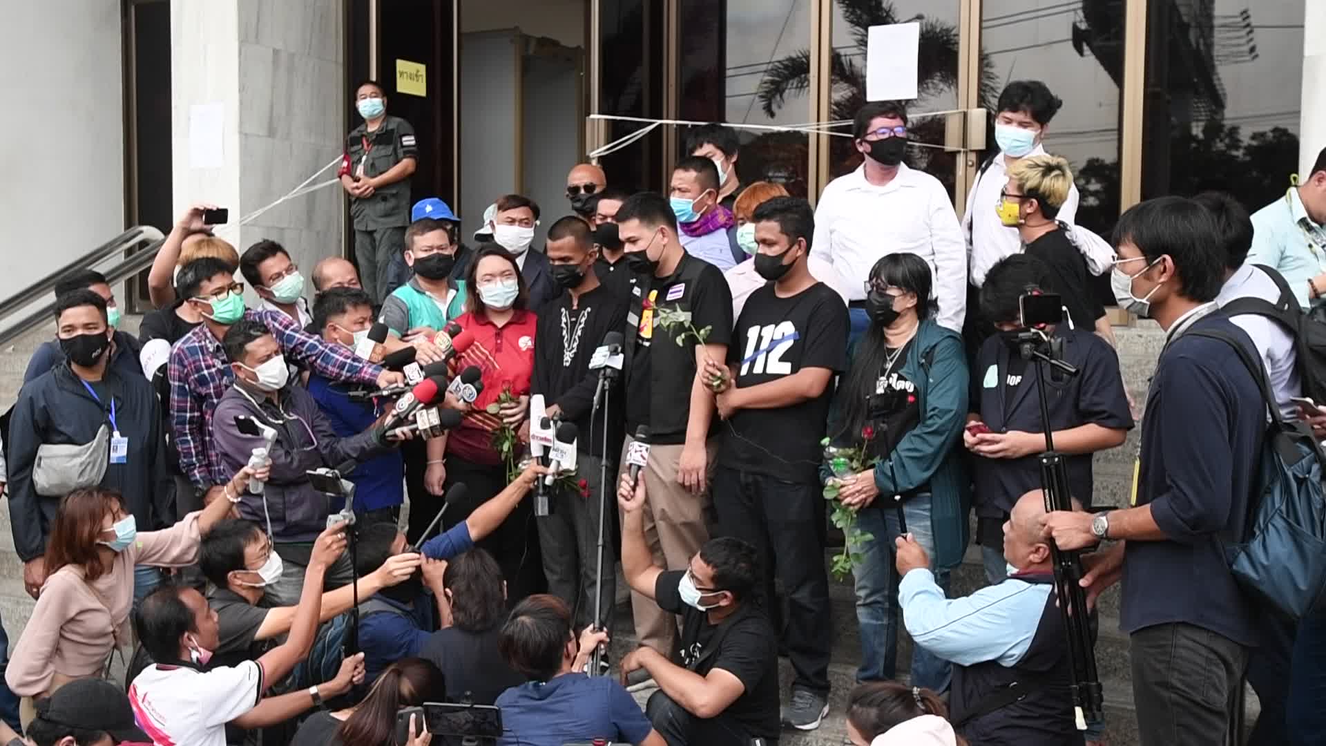 Thai pro-democracy activists report themselves on charges of insulting the royal