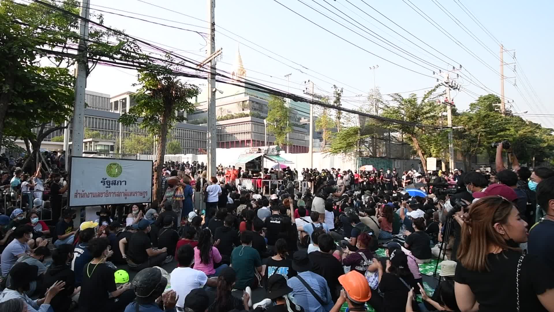 Protest outside the parliament after Thai prime minister survives no-confidence vote
