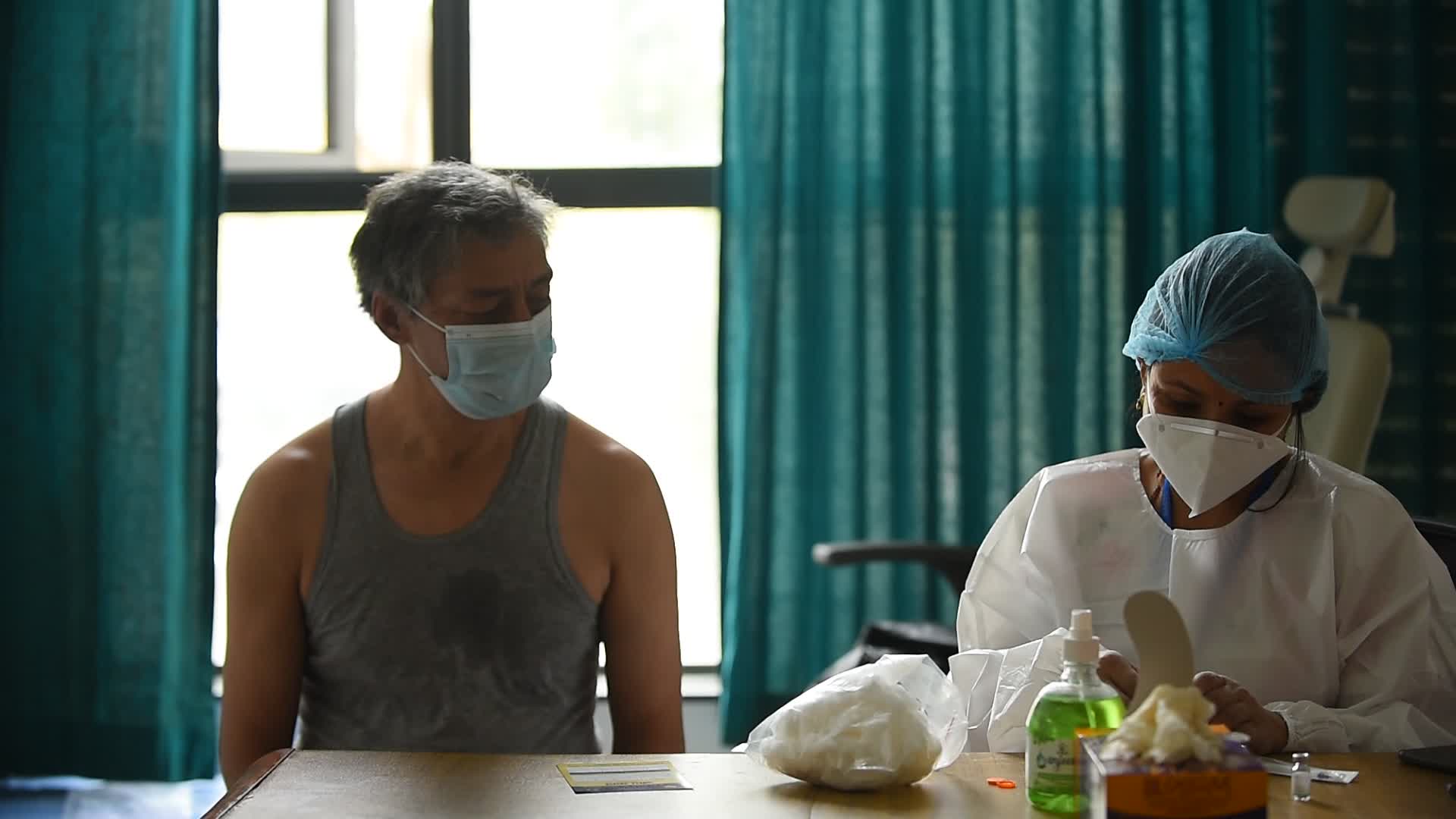 Nepal starts China donated COVID-19 vaccination