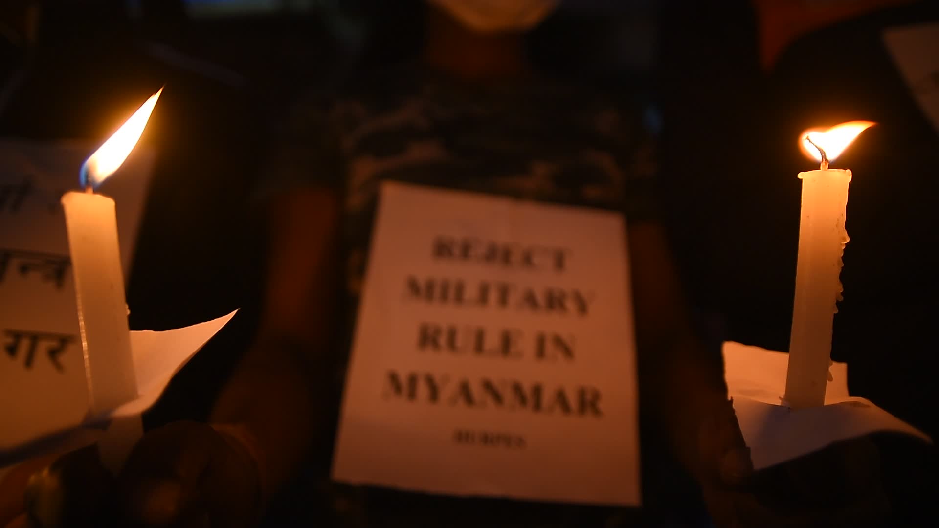 Human Rights activists hold candle light to protest against Myanmar Military Coup