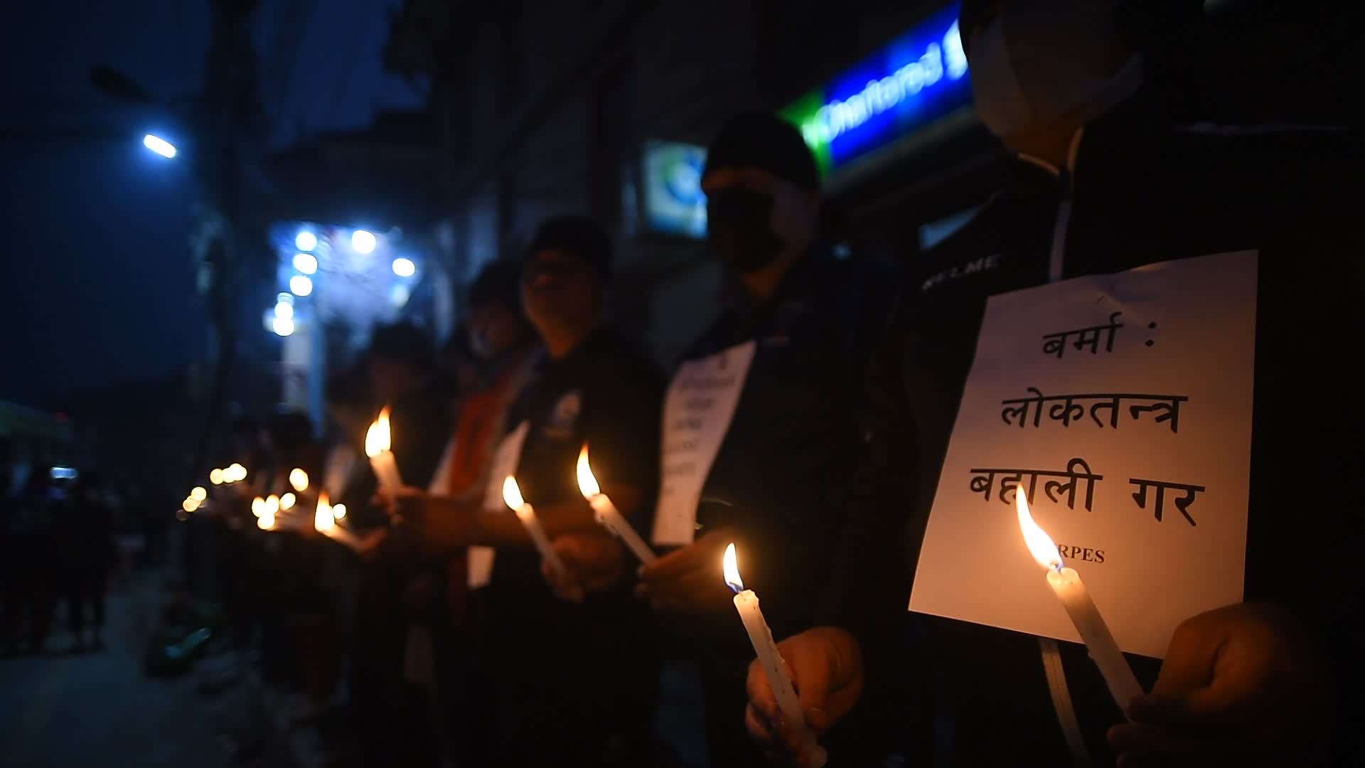 Human Rights activists hold candle light to protest against Myanmar Military Coup