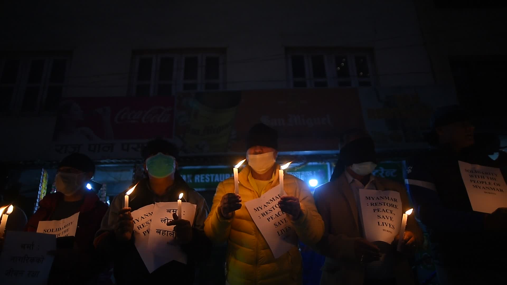 Human Rights activists hold candle light to protest against Myanmar Military Coup