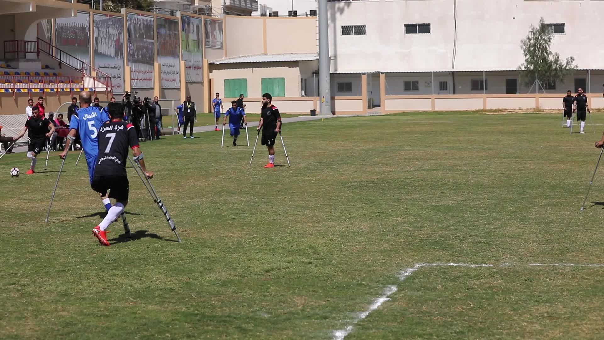 Palestinian amputees play soccer during a local championship in Gaza