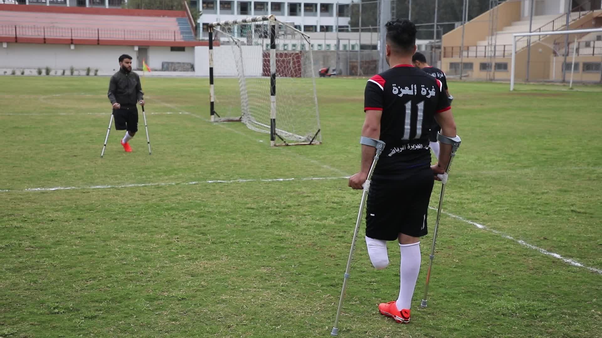 Palestinian amputees play soccer during a local championship in Gaza