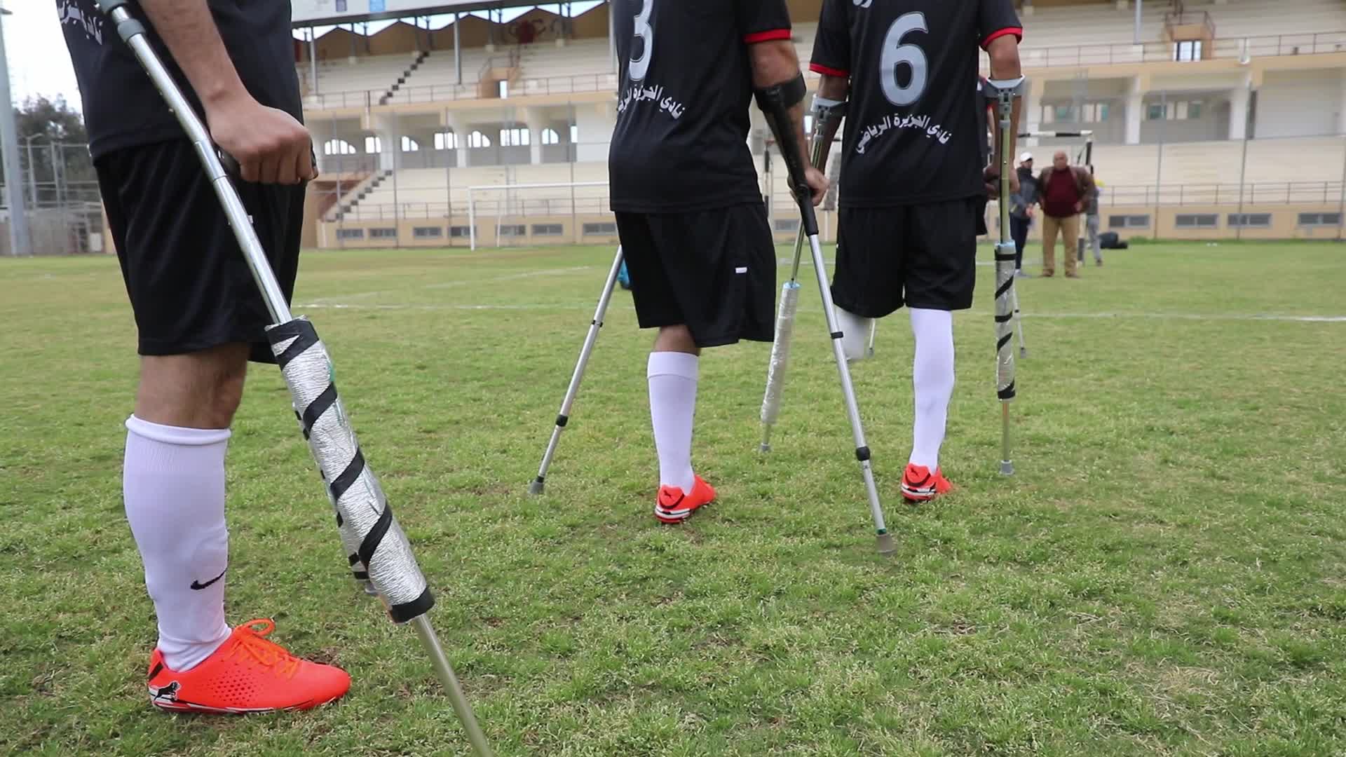Palestinian amputees play soccer during a local championship in Gaza