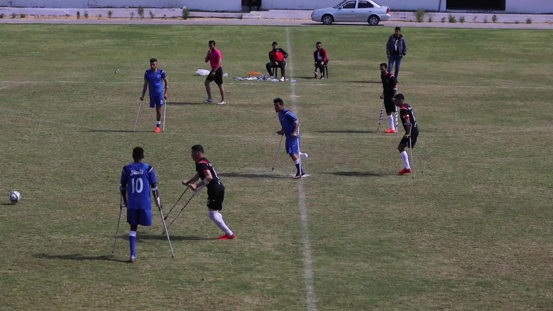 Palestinian amputees play soccer during a local championship in Gaza