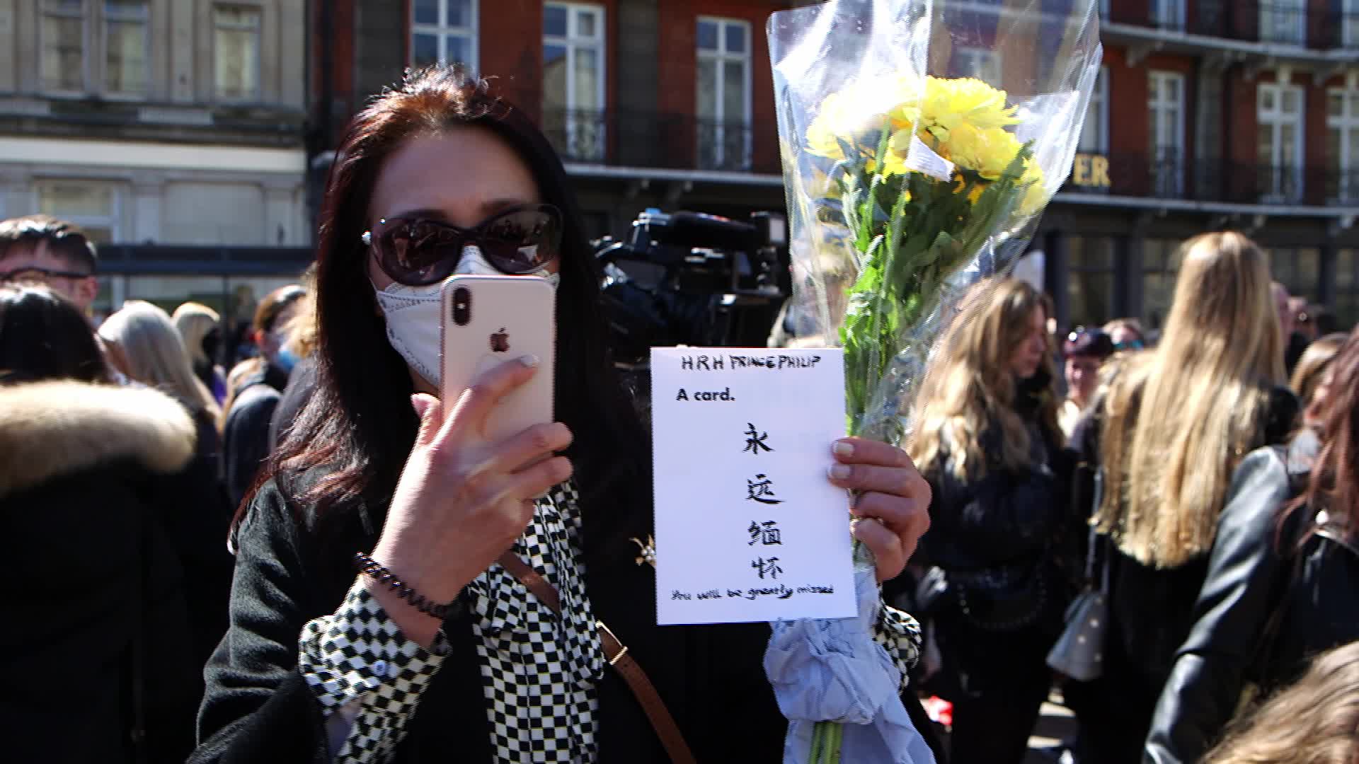People attend the funeral of Prince Philip