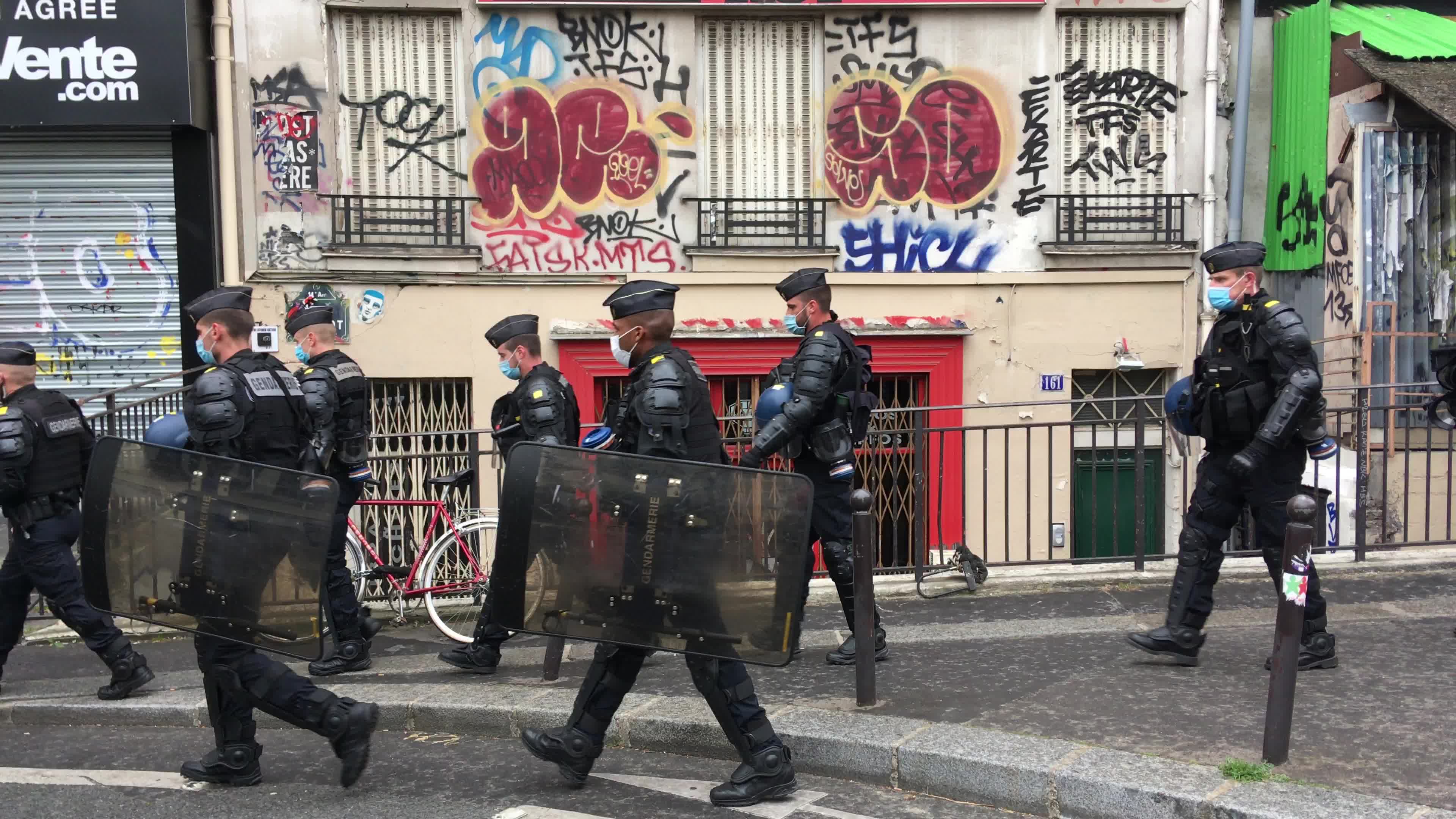 Protesters clash in Paris during the May Day