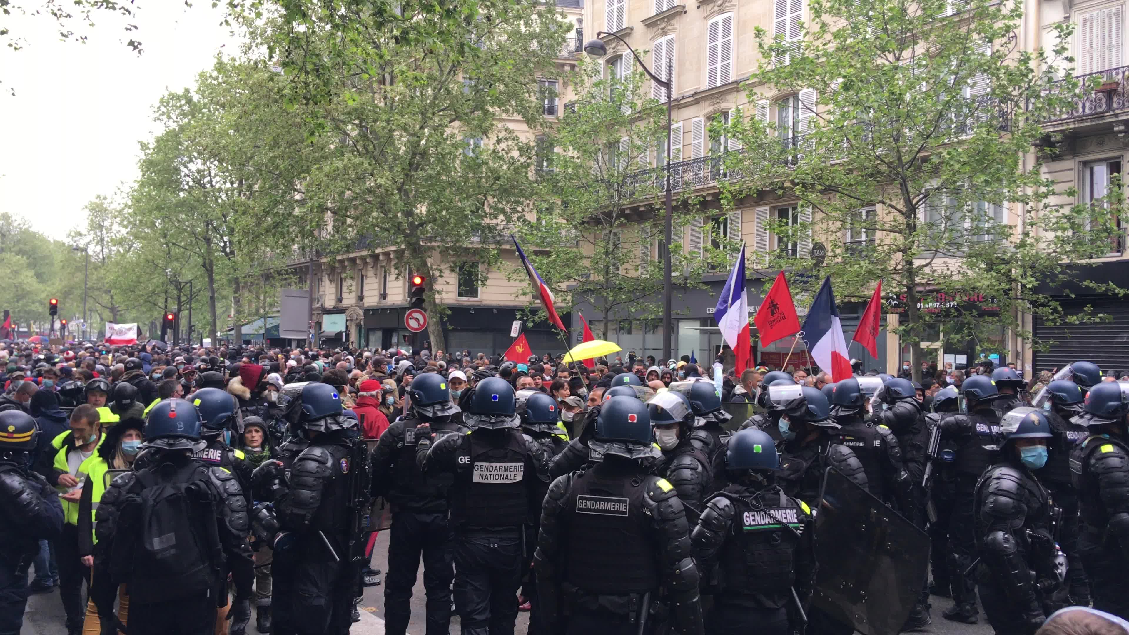 Protesters clash in Paris during the May Day