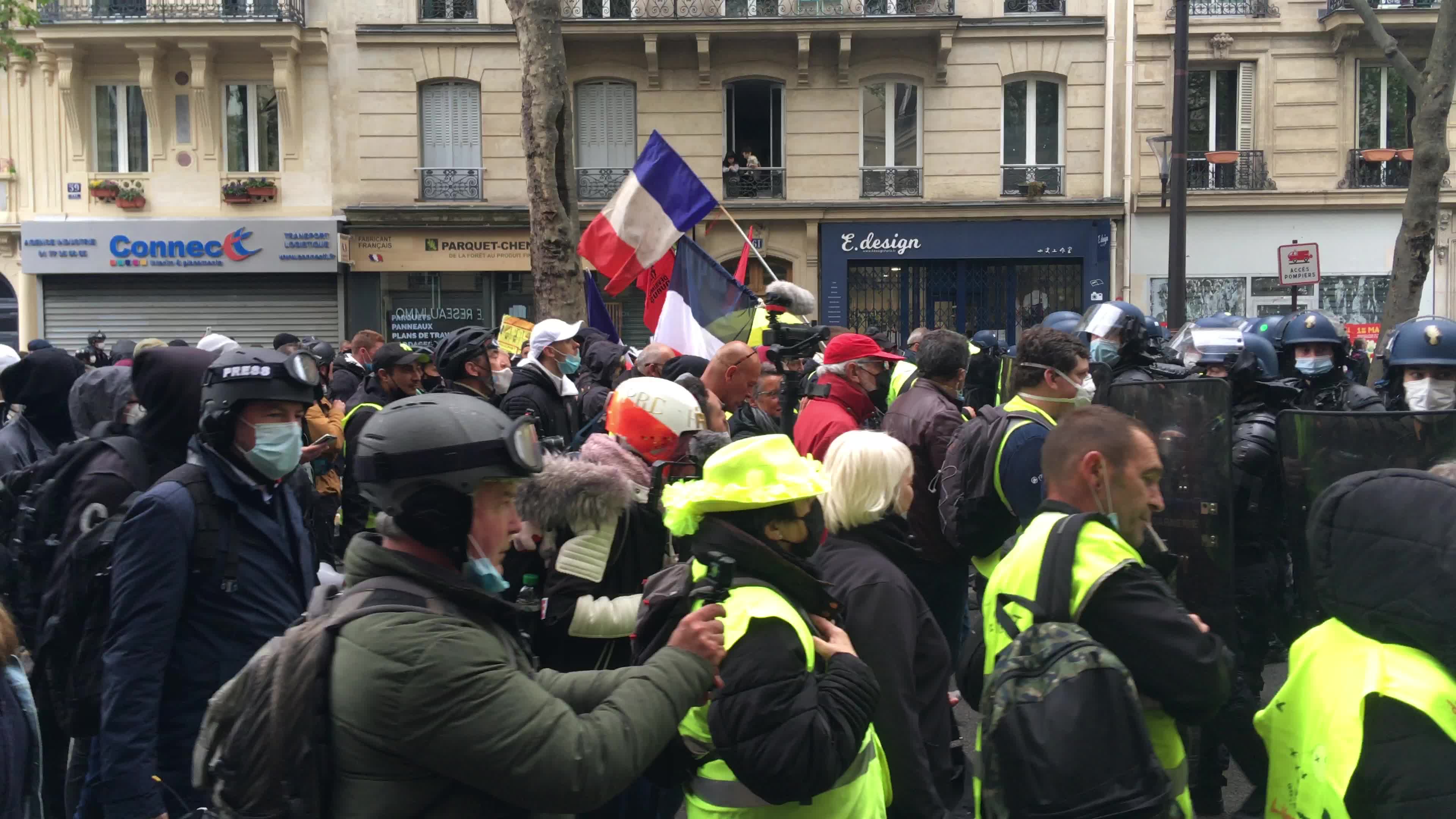 Protesters clash in Paris during the May Day