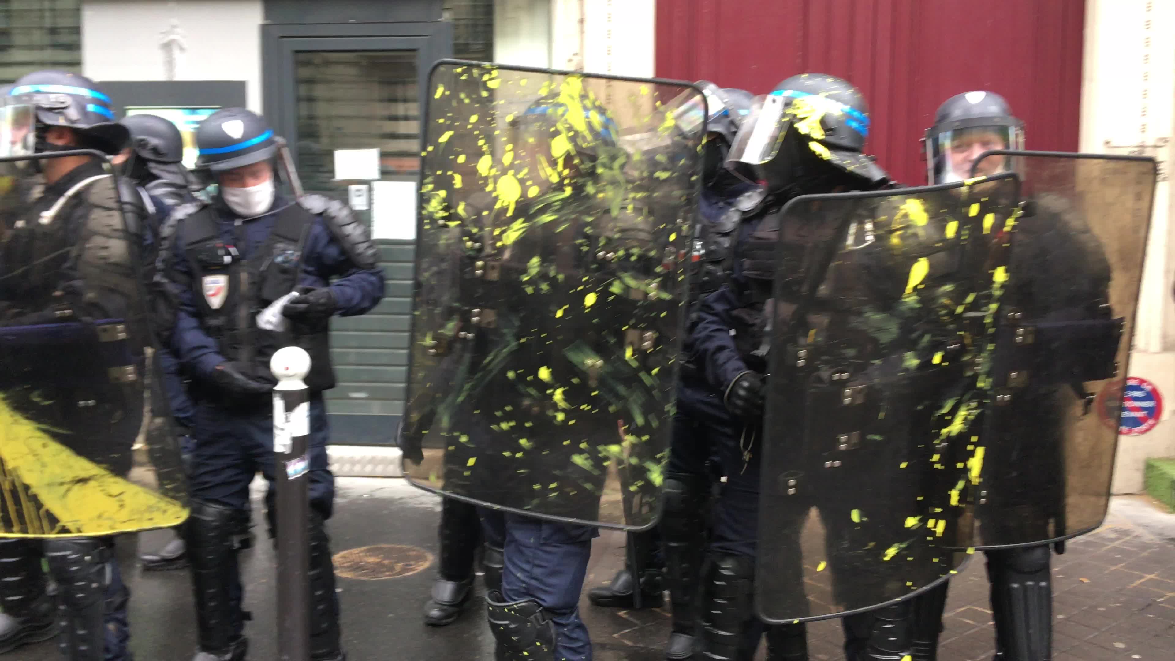 Protesters clash in Paris during the May Day