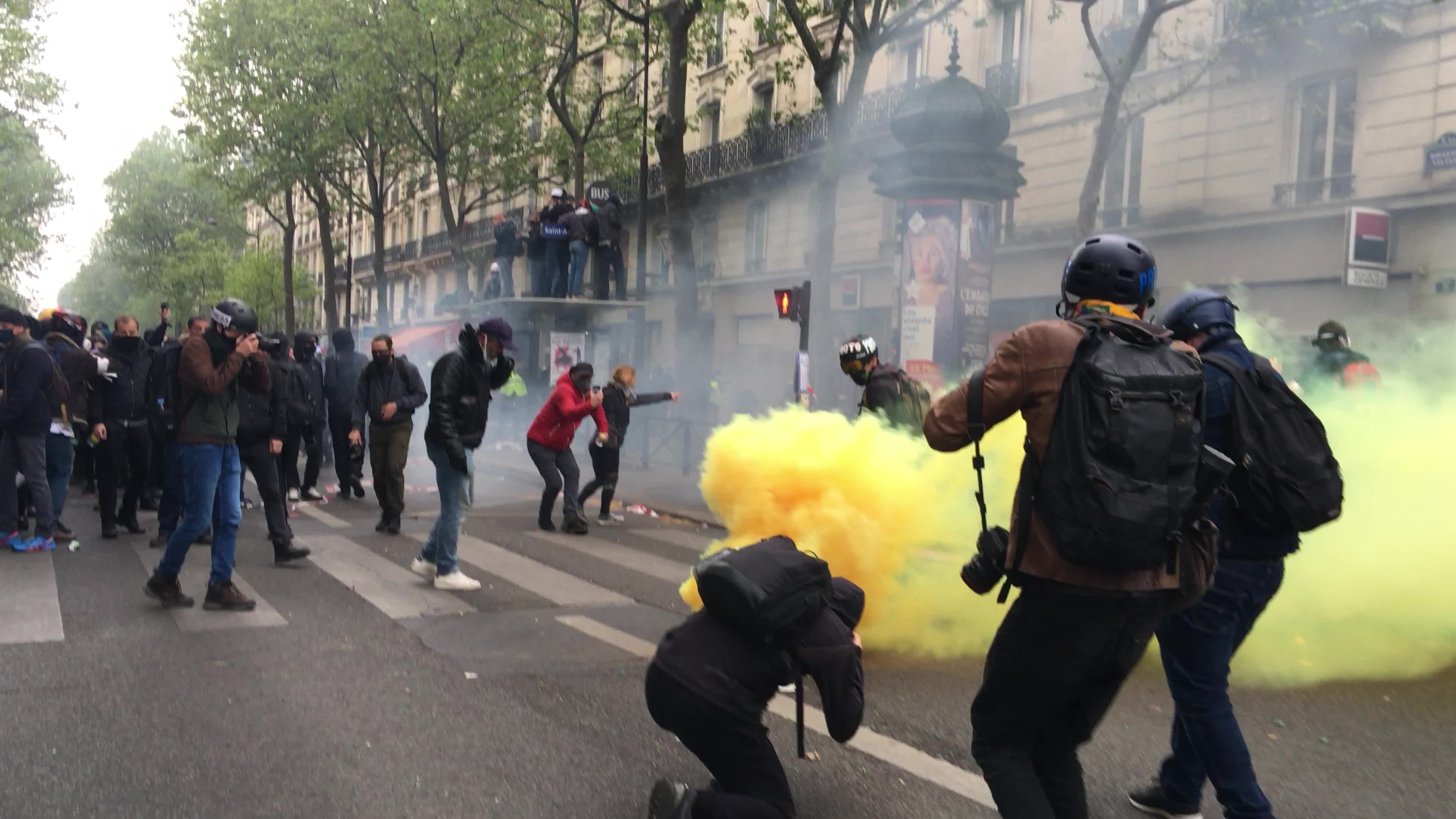 Protesters clash in Paris during the May Day