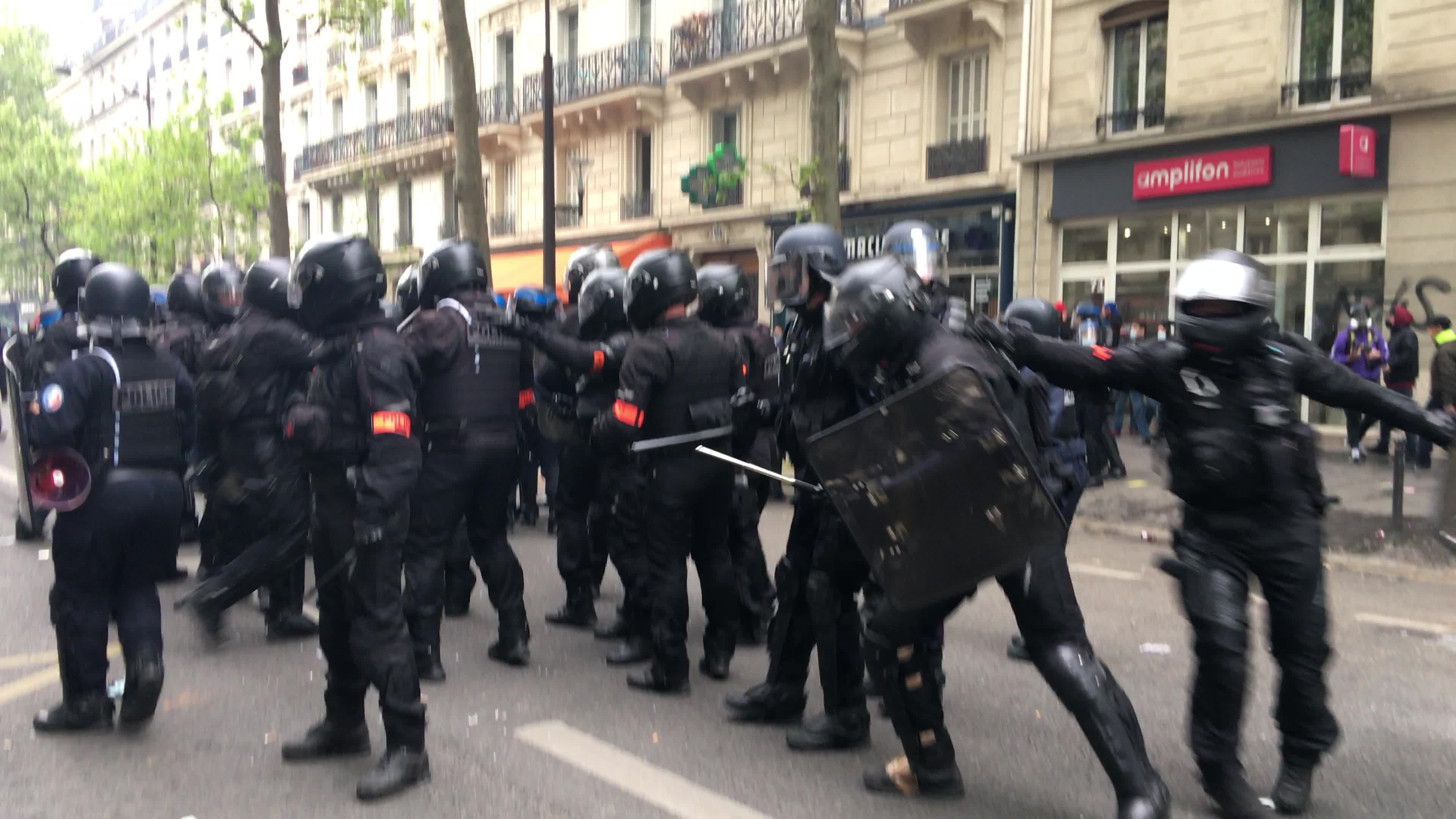 Protesters clash in Paris during the May Day