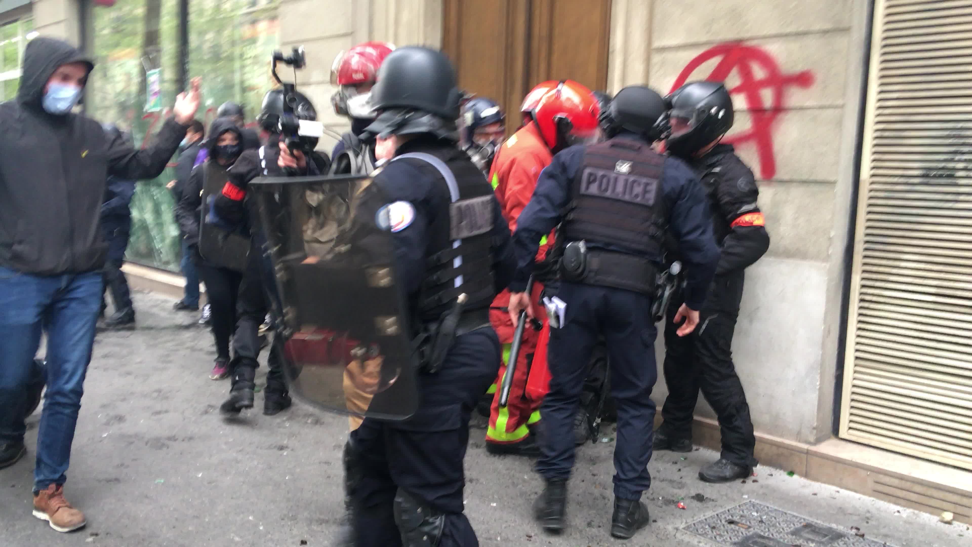 Protesters clash in Paris during the May Day