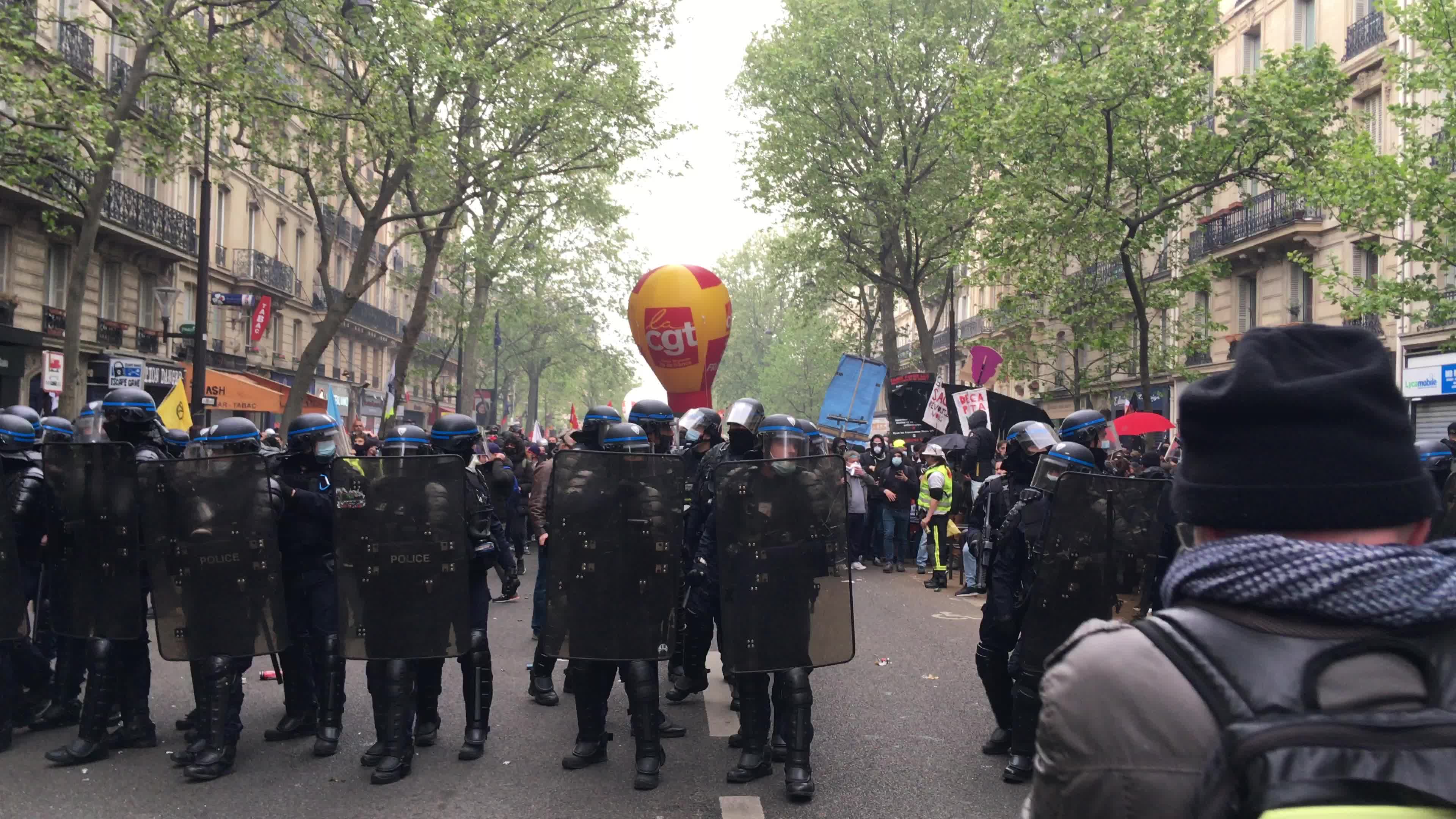 Protesters clash in Paris during the May Day