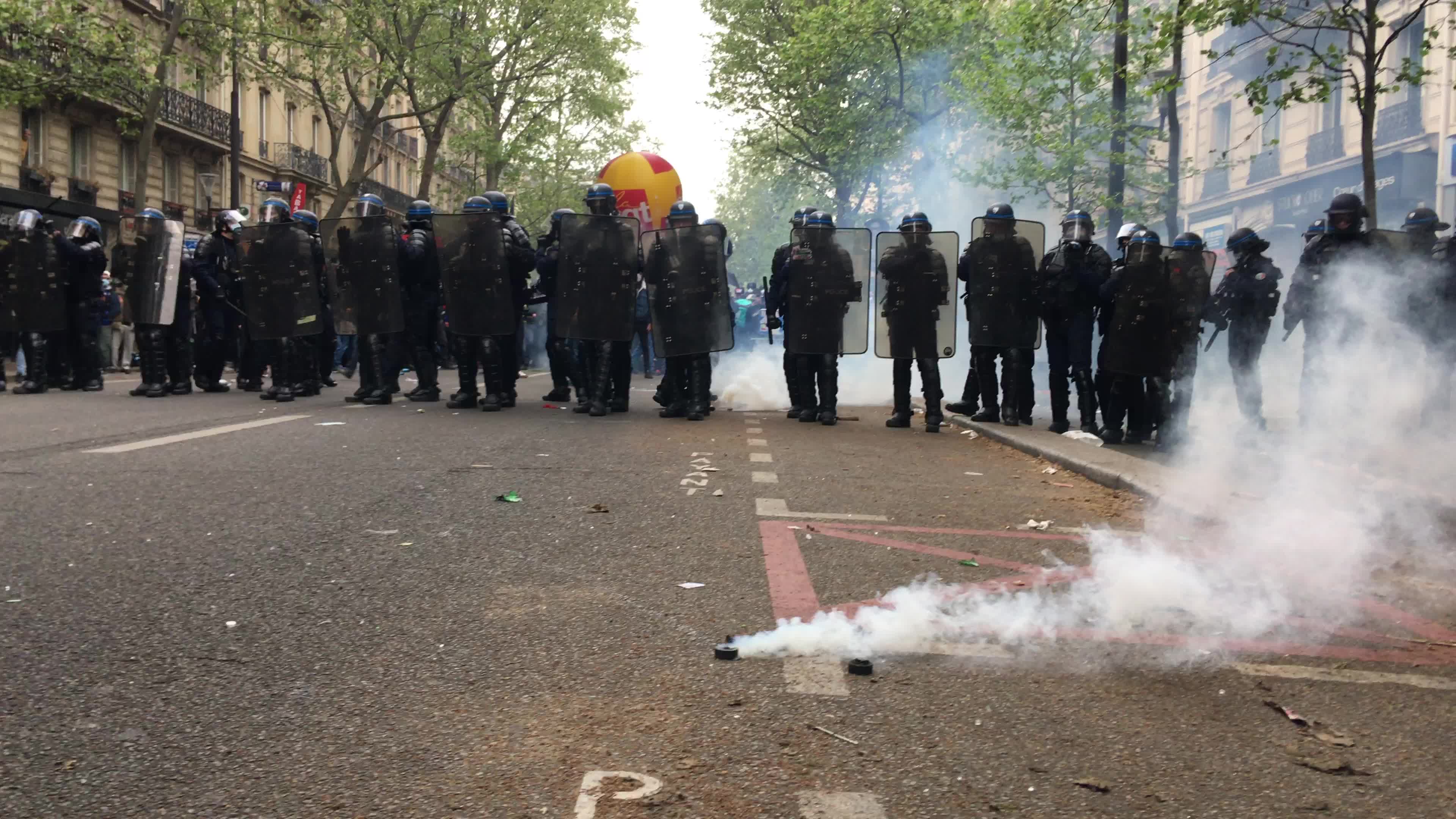 Protesters clash in Paris during the May Day