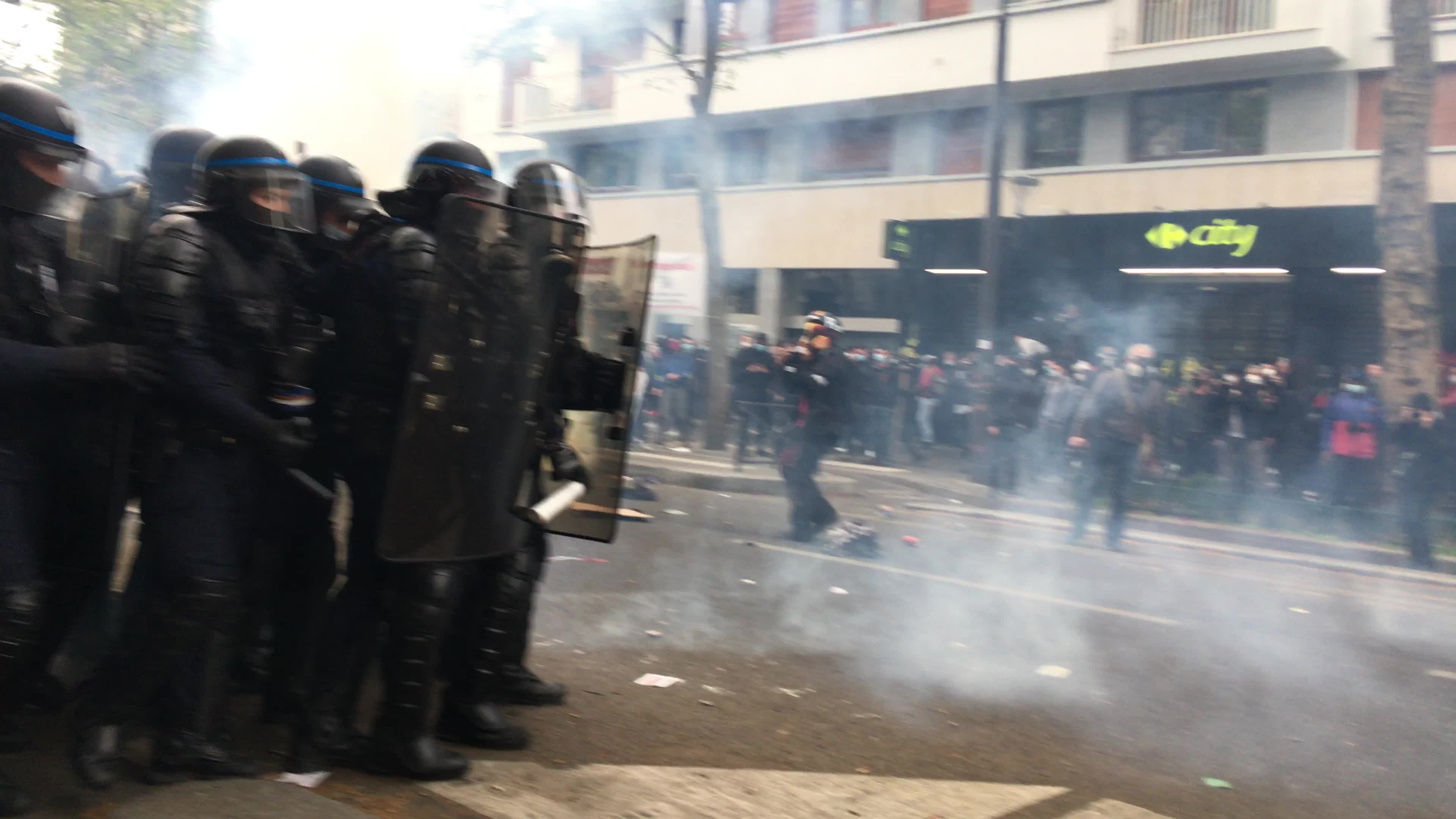 Protesters clash in Paris during the May Day