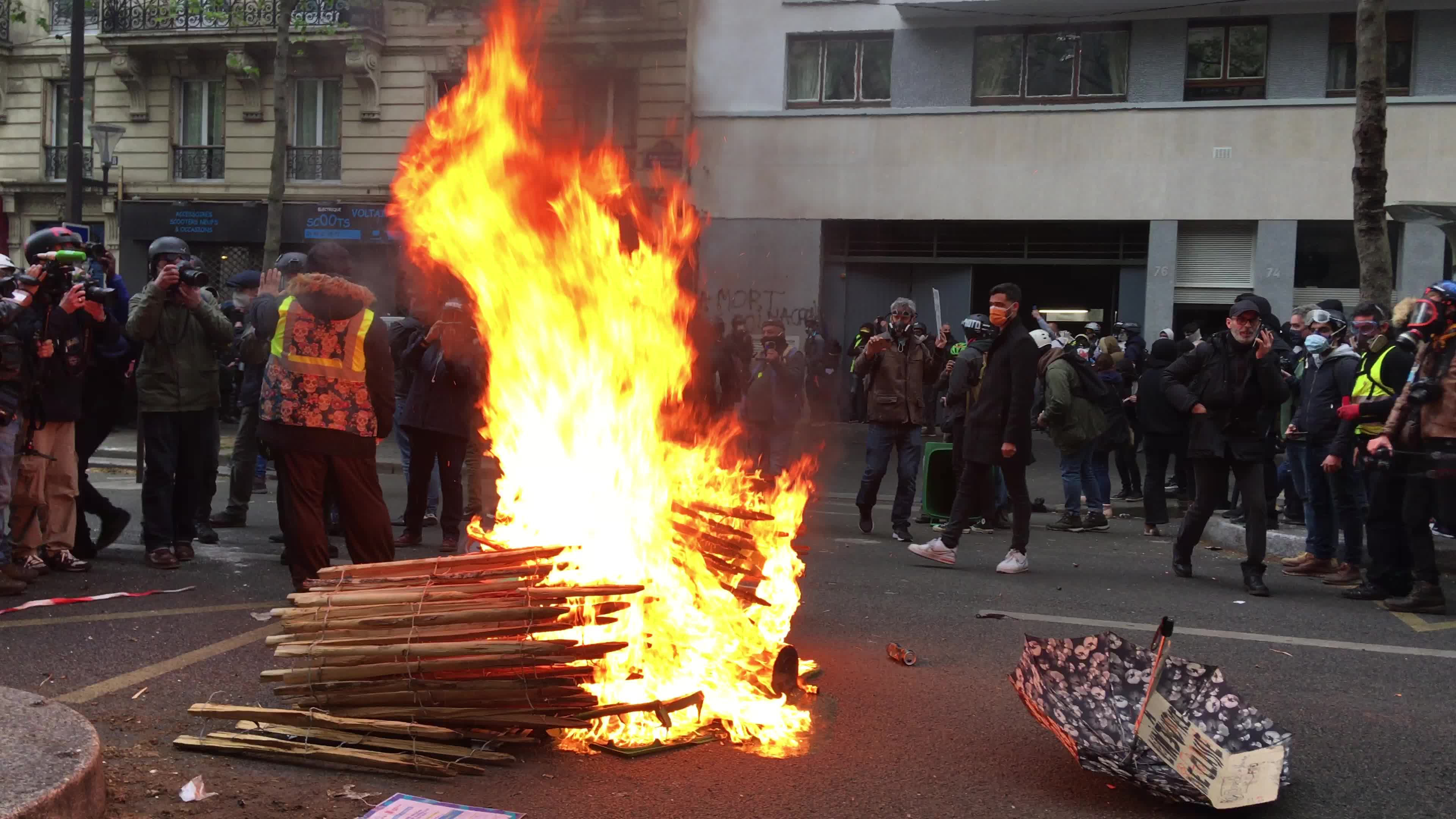 Protesters clash in Paris during the May Day