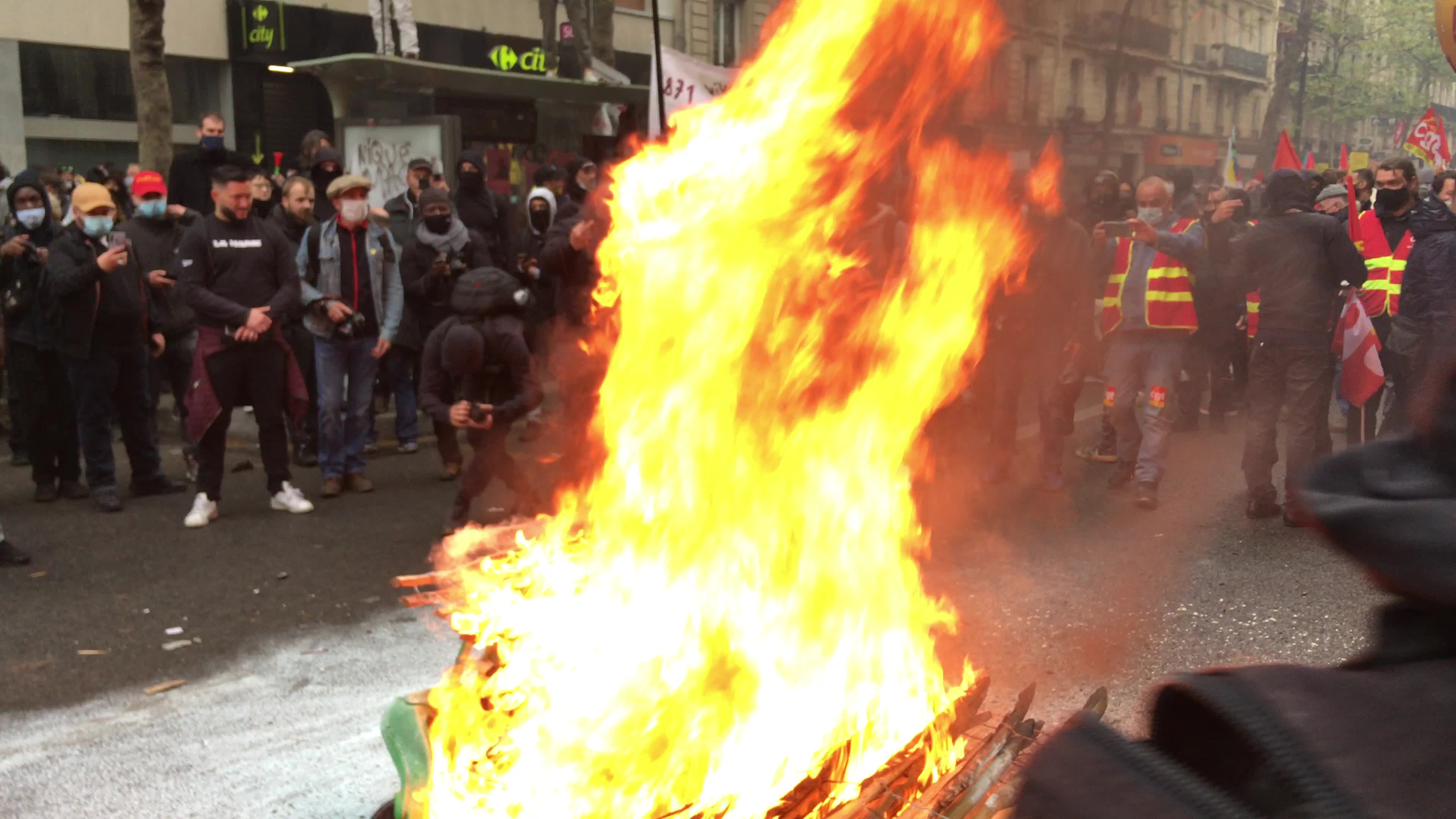 Protesters clash in Paris during the May Day