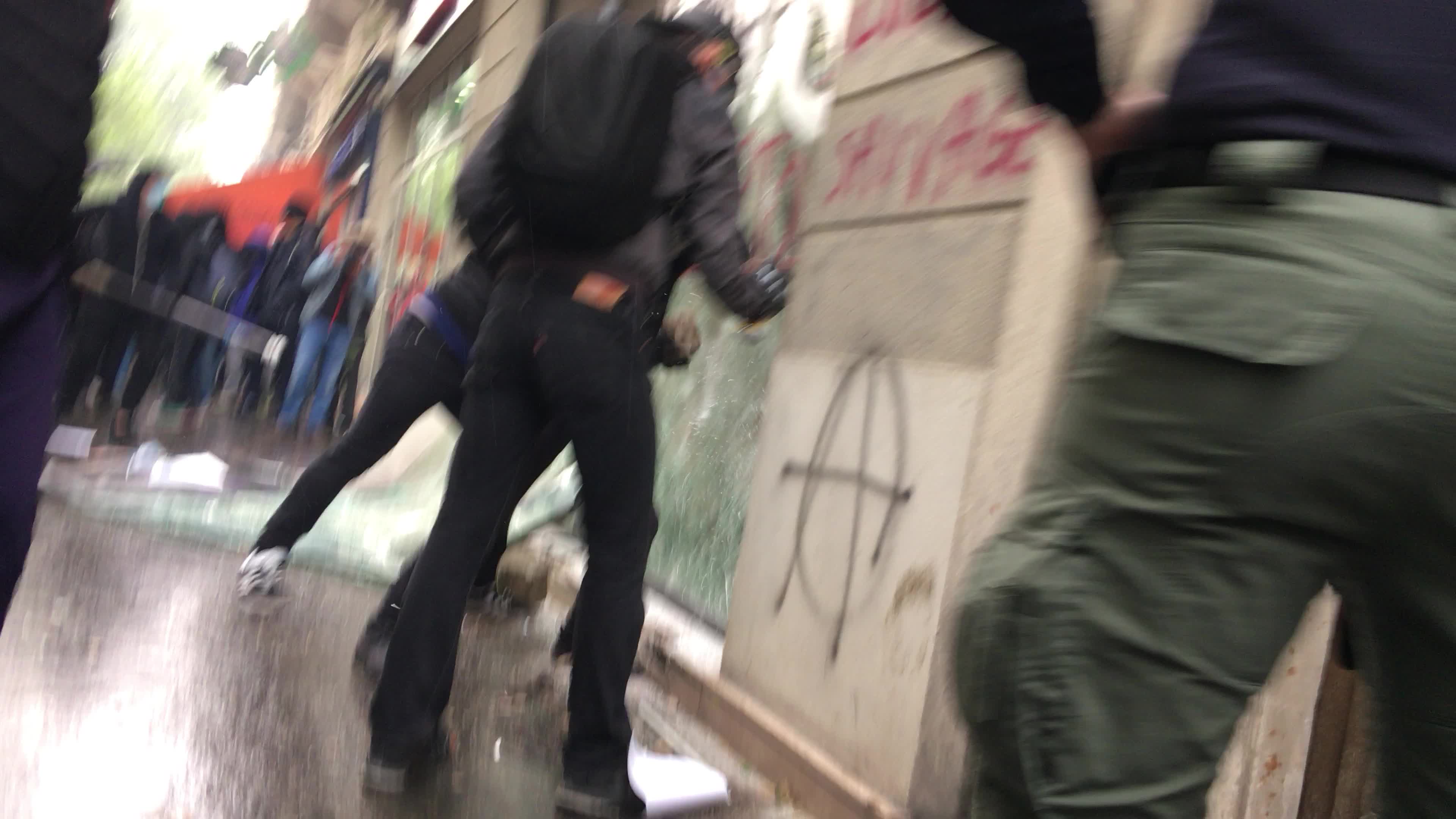 Protesters clash in Paris during the May Day