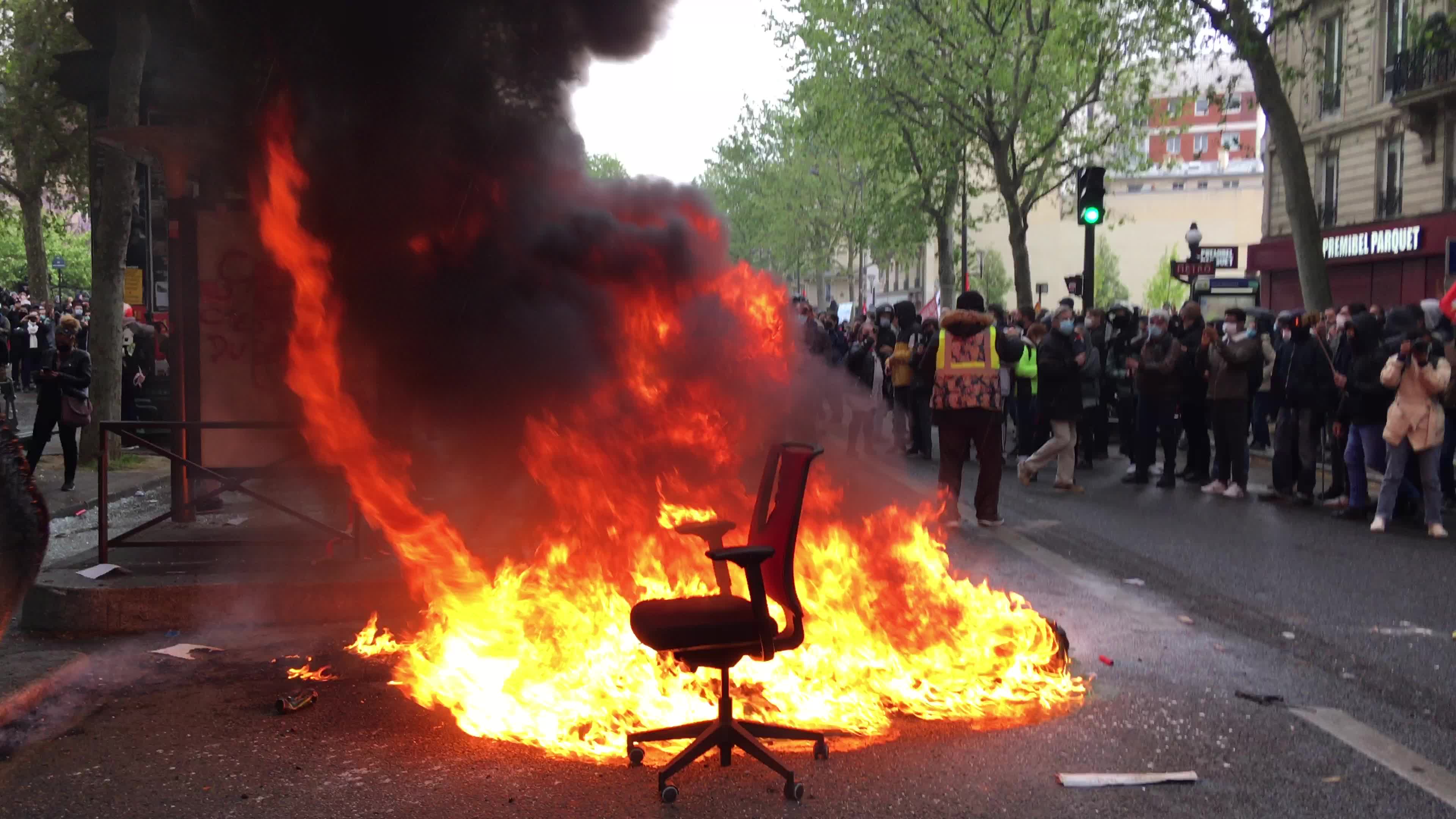 Protesters clash in Paris during the May Day