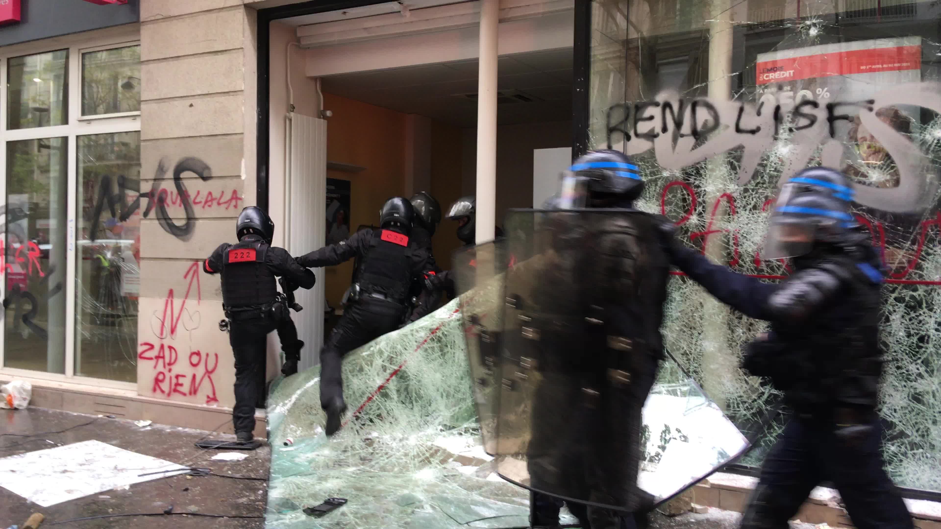 Protesters clash in Paris during the May Day
