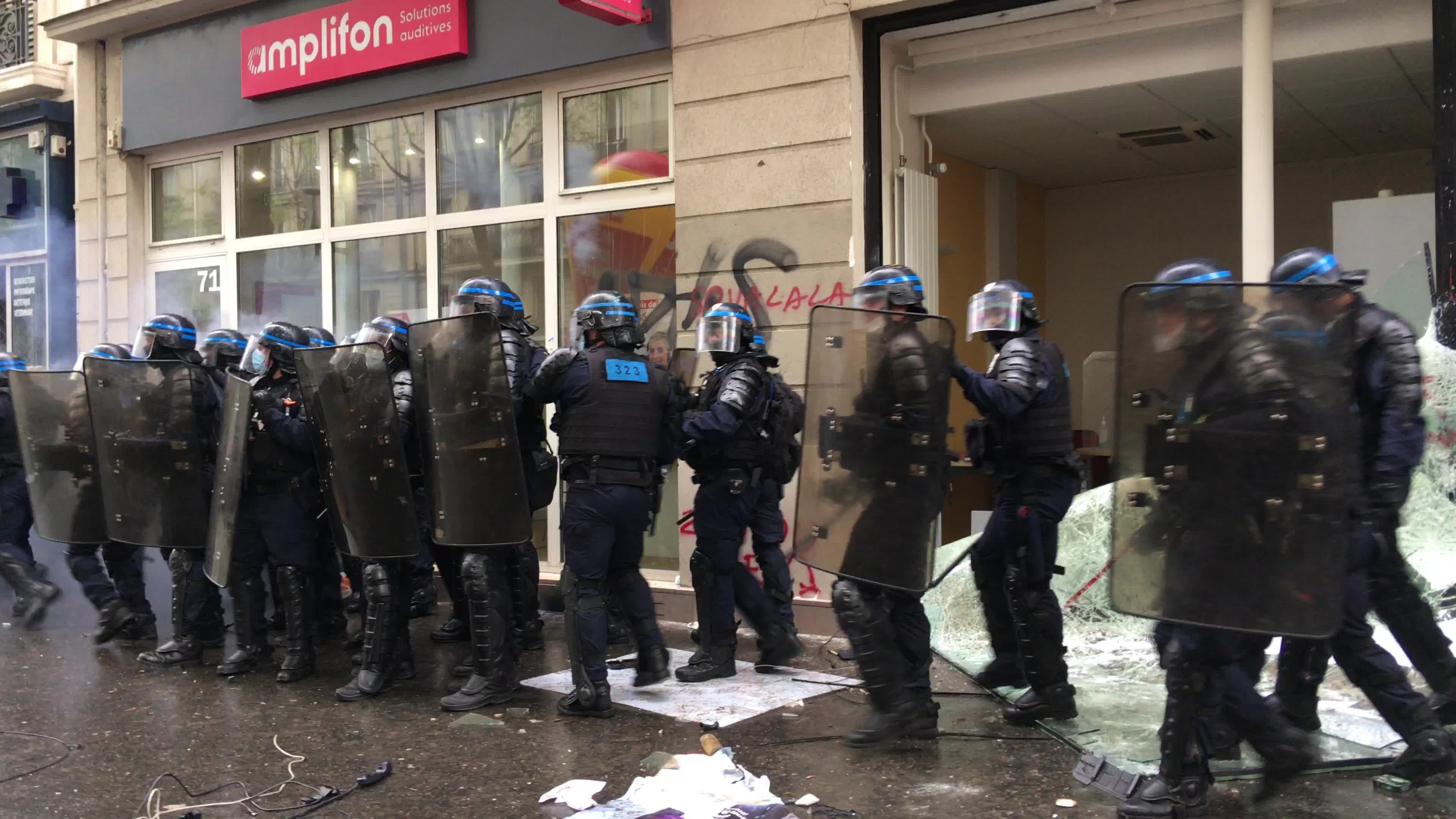 Protesters clash in Paris during the May Day