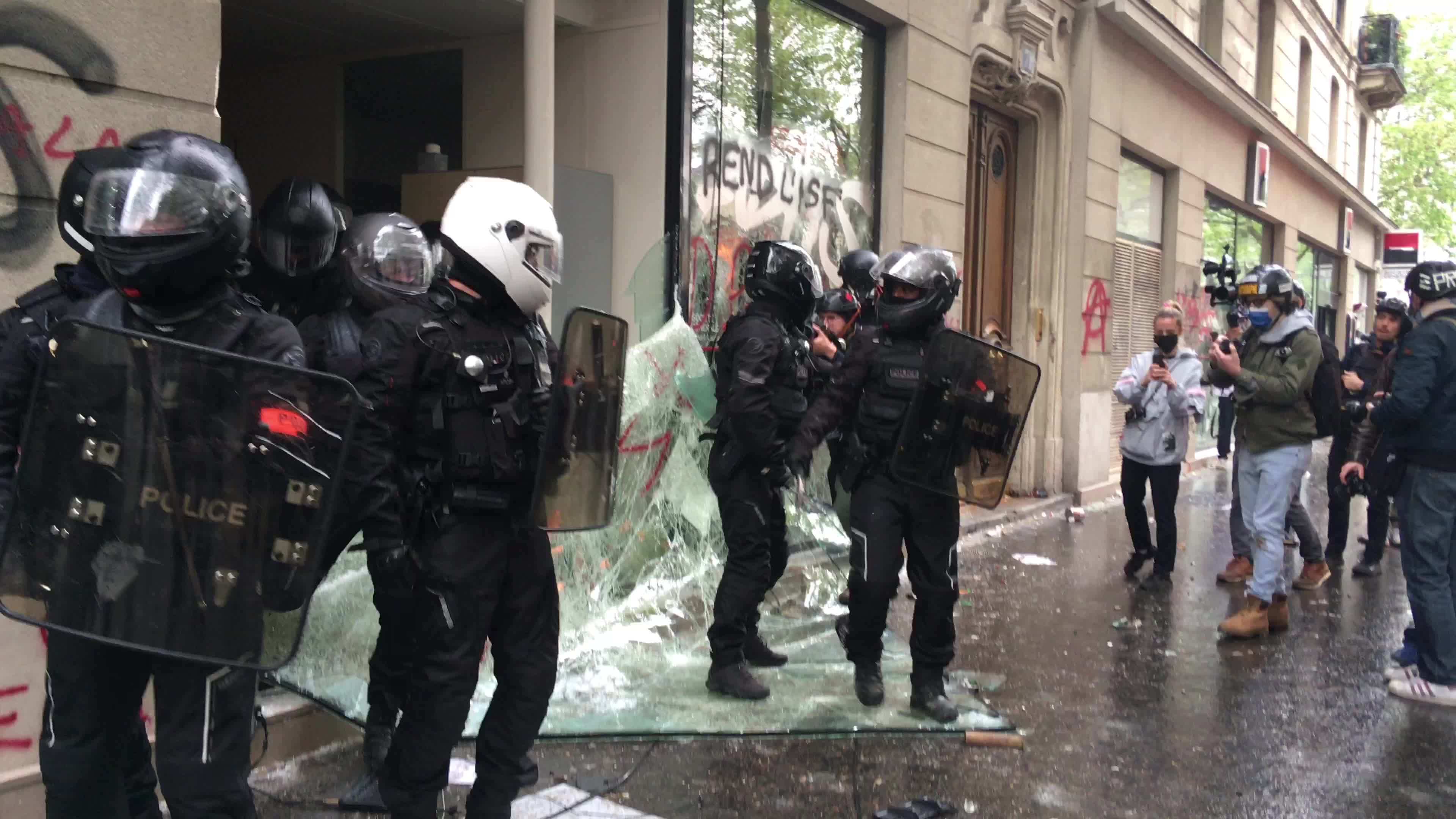 Protesters clash in Paris during the May Day