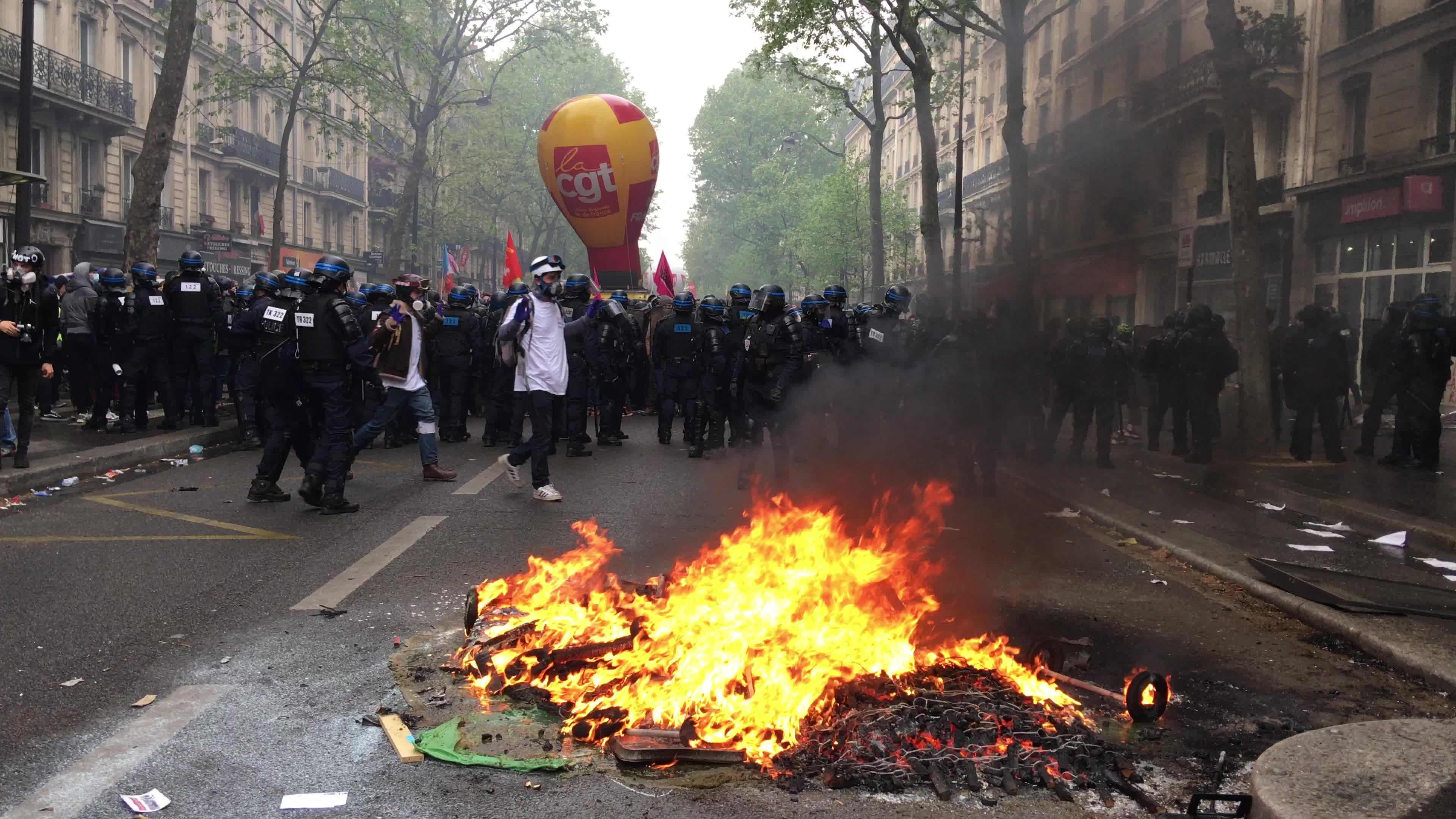 Protesters clash in Paris during the May Day