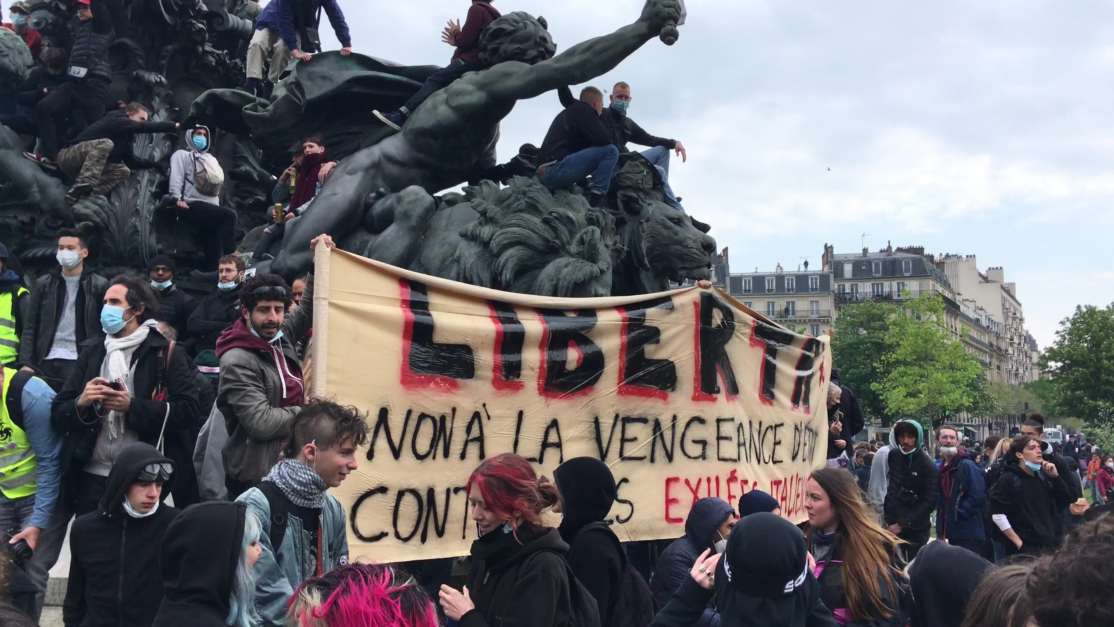 Protesters clash in Paris during the May Day